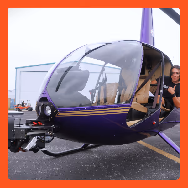 An R44 helicopter with Phoenix Lidar payload.