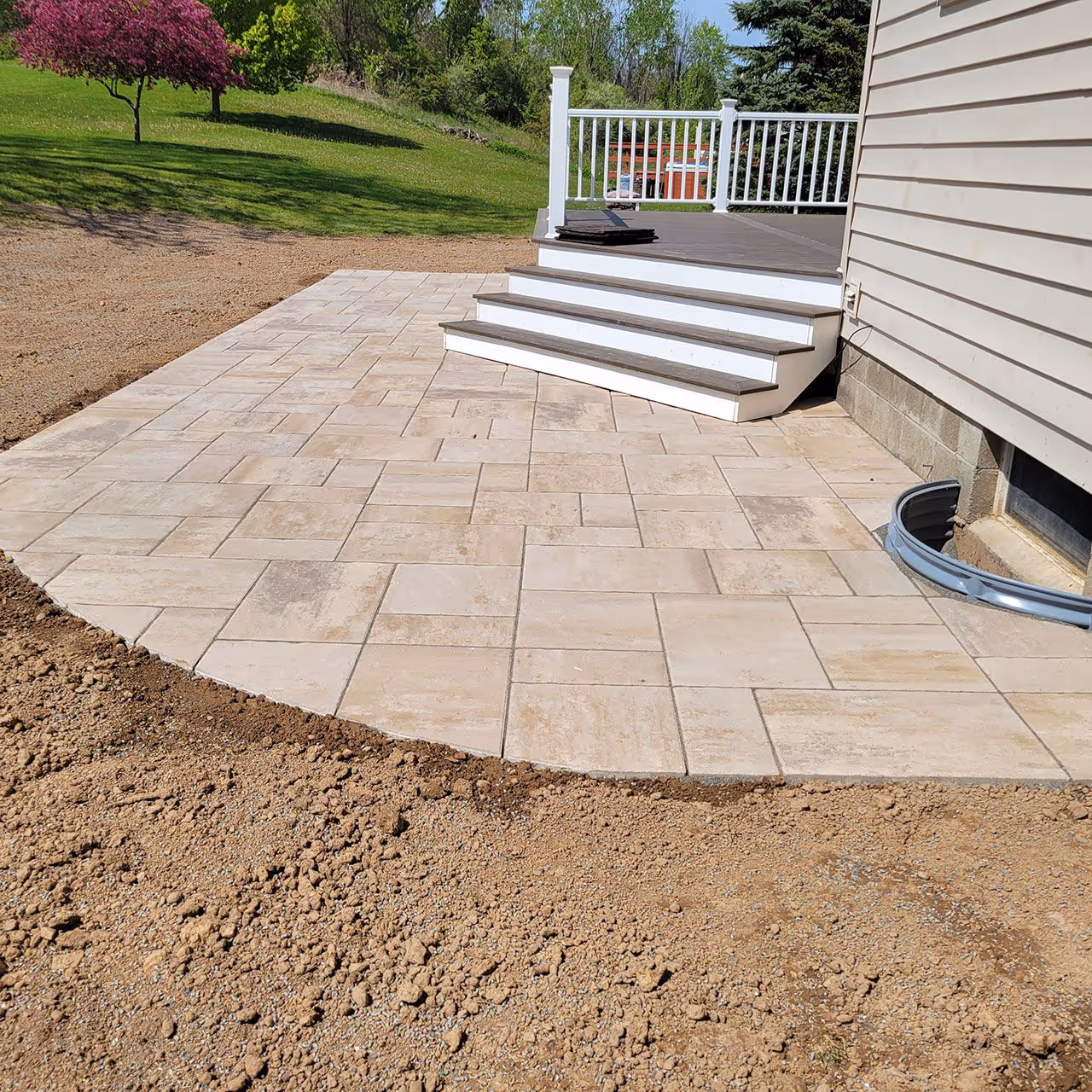 backyard hardscape design with patio and walkway features