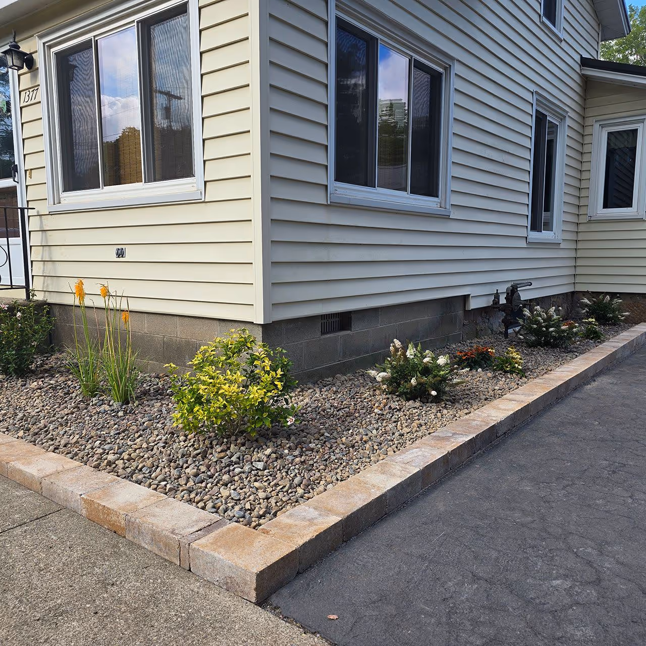 fresh mulch beds and plant installation landscaping near me