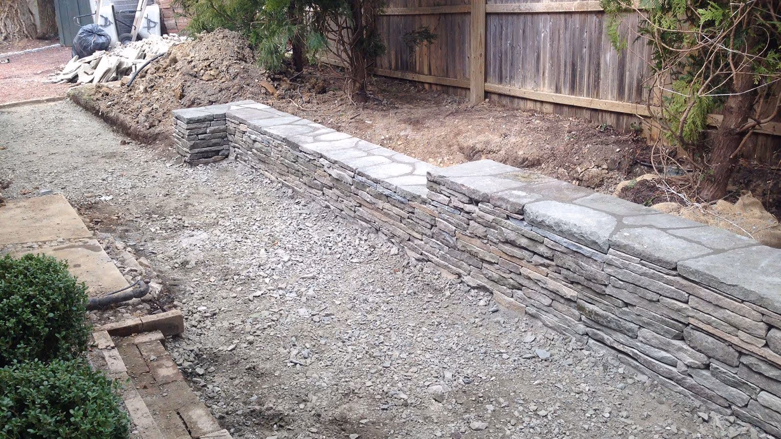 Retaining wall installation by Adriano Landscaping in Trenton NJ for durable and functional landscaping