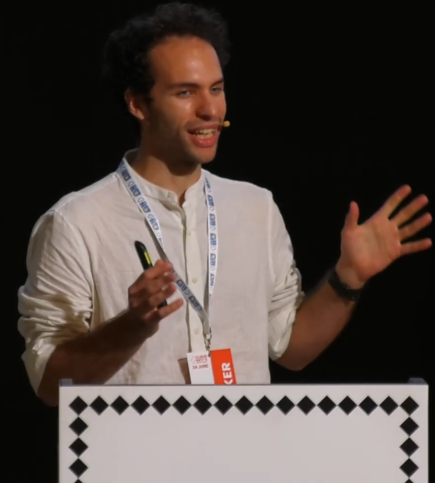 Riccardo Capraro speaking at Cloud Native Days Italy 2025