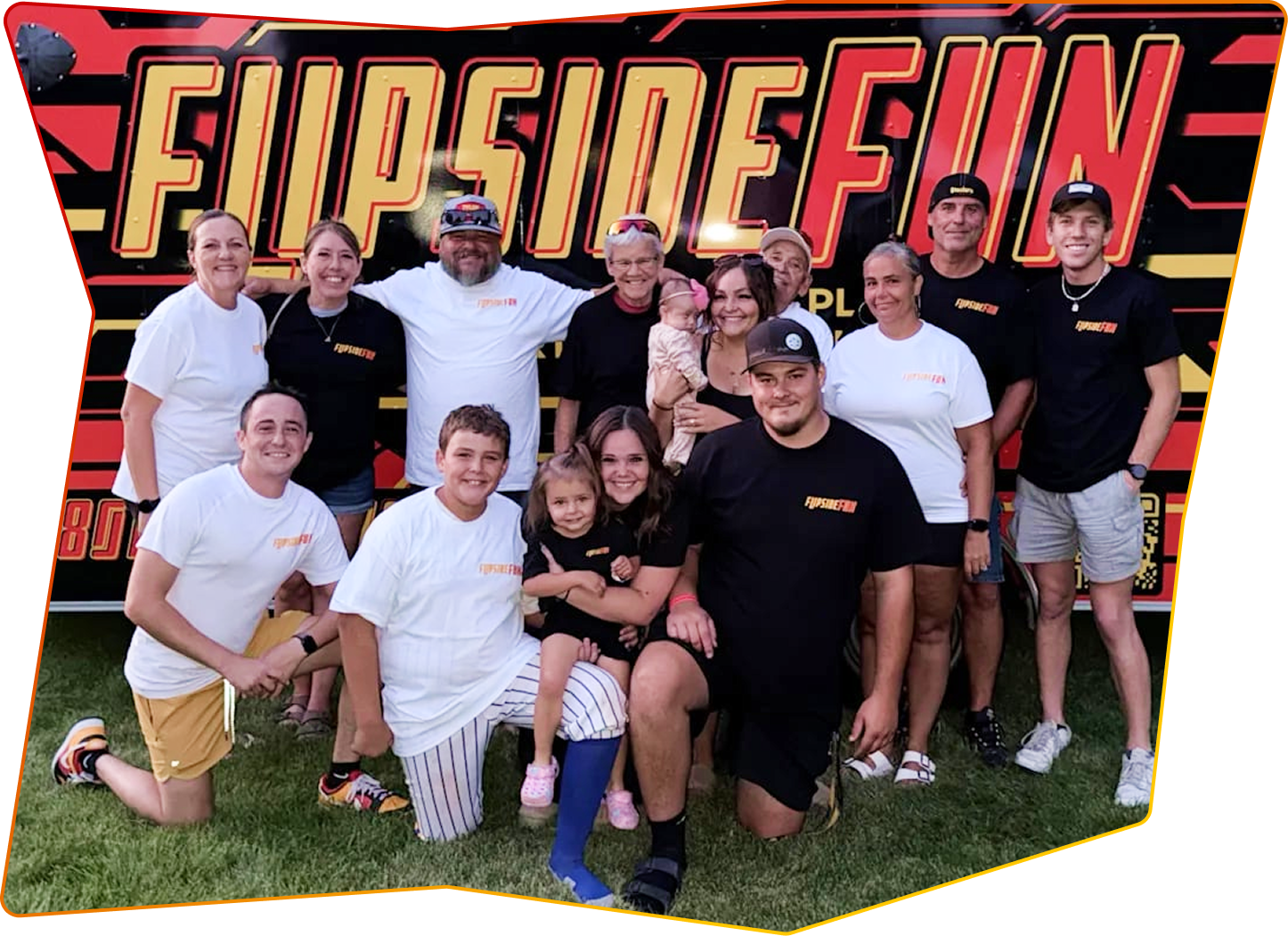 Flipside Fun team members taking a group photo at an event.