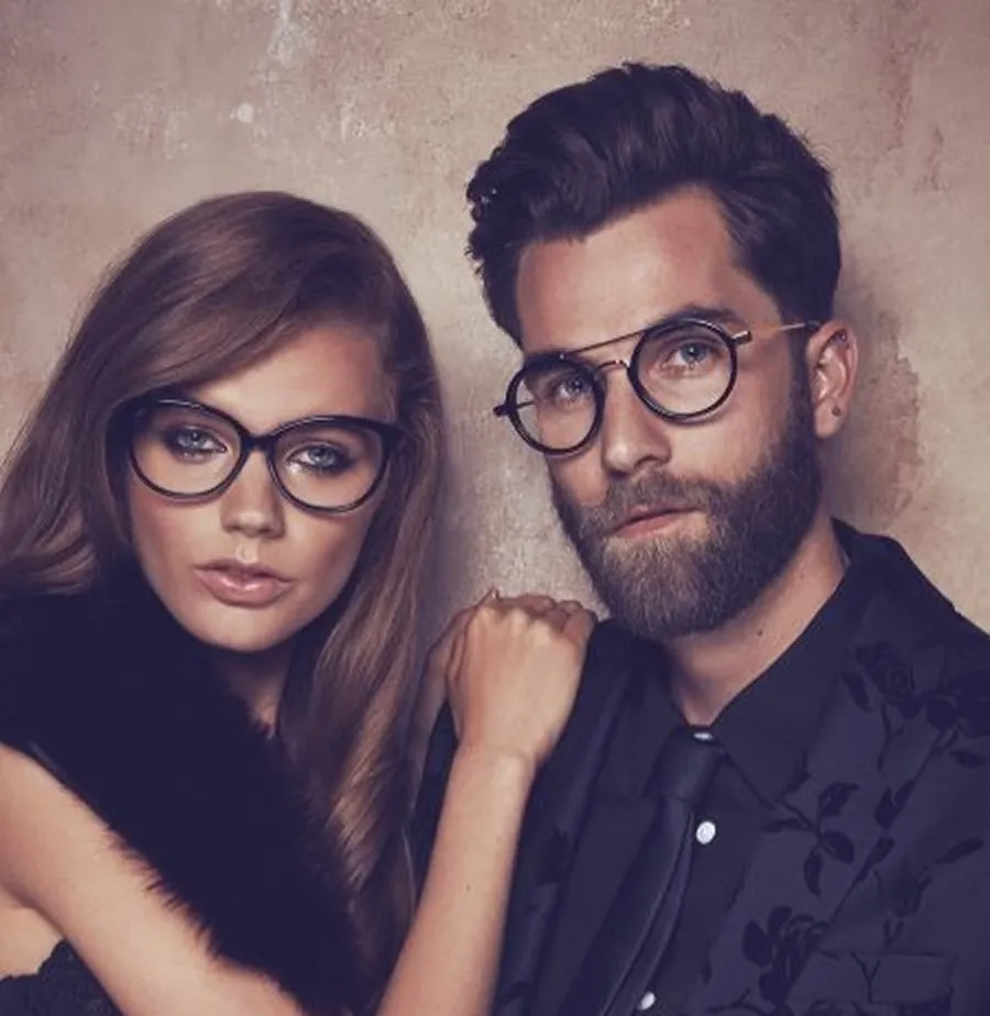 Couple wearing stylish designer eyeglass frames