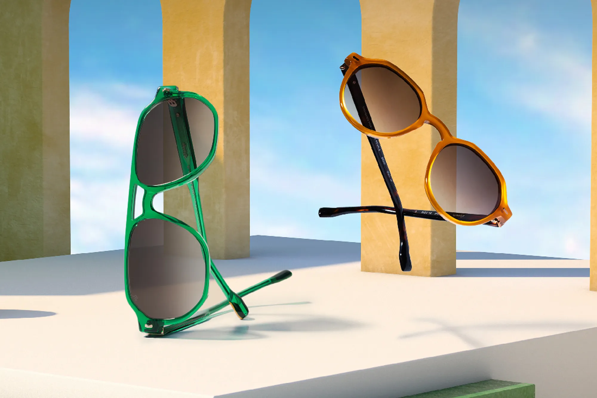Woodys ad showing green and amber sunglasses on a stage with arches and the Woodys logo.