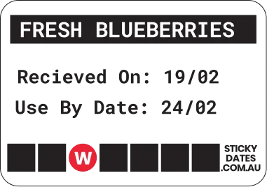 Text reading 'FRESH BLUEBERRIES' in white uppercase letters on a black background with a red and white 'W' logo beneath.