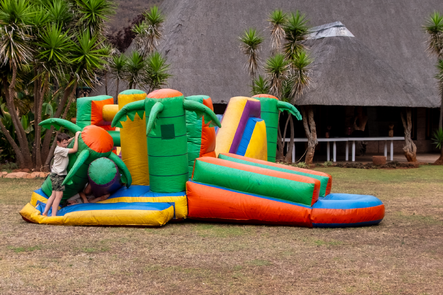Children playing on a jumping castle at Zebra Nature Reserve.