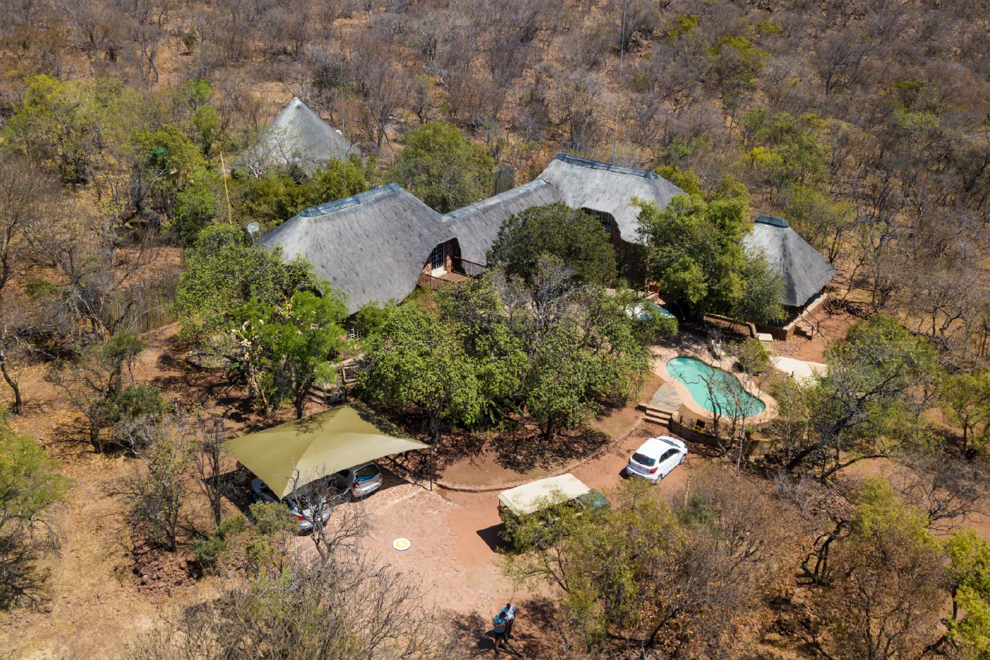 Private villa with pool and outdoor dining area overlooking Zebra Nature Reserve