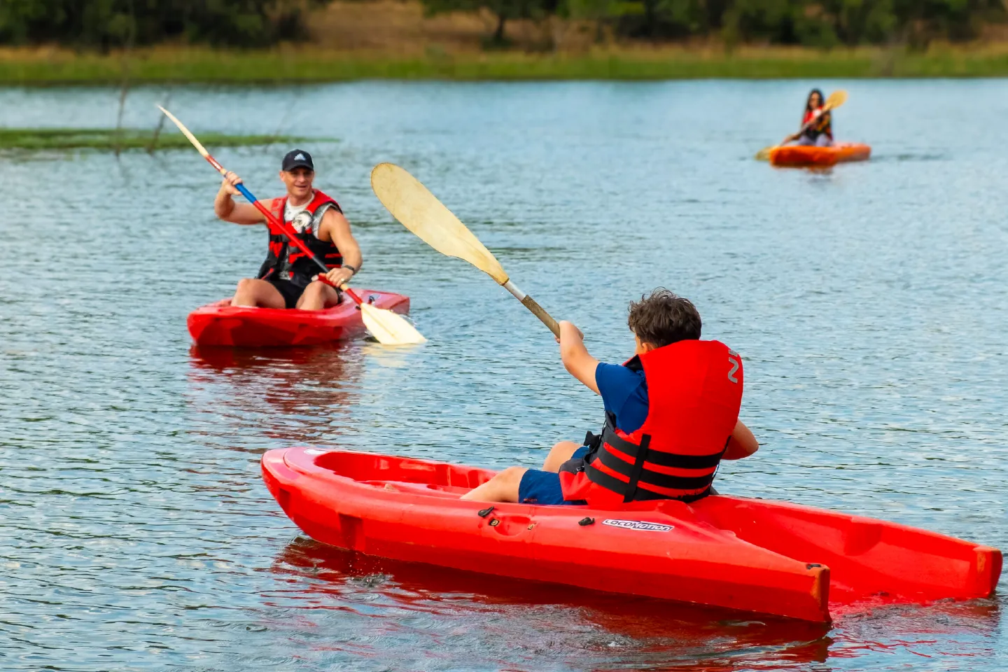 Guests kayaking on the dam at Zebra Nature Reserve.