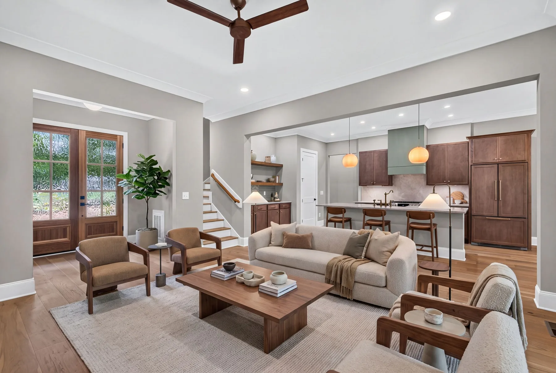 Virtually staged open-concept living room and kitchen in Apex