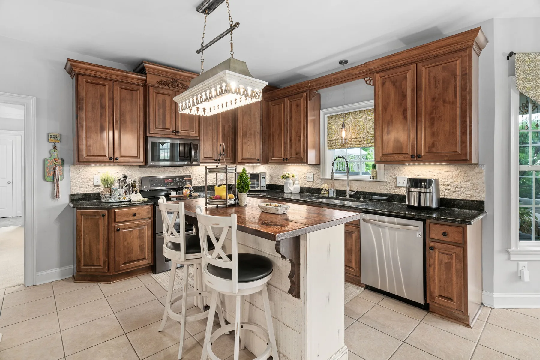 Wood-cabinet kitchen photographed in a Clayton, North Carolina home
