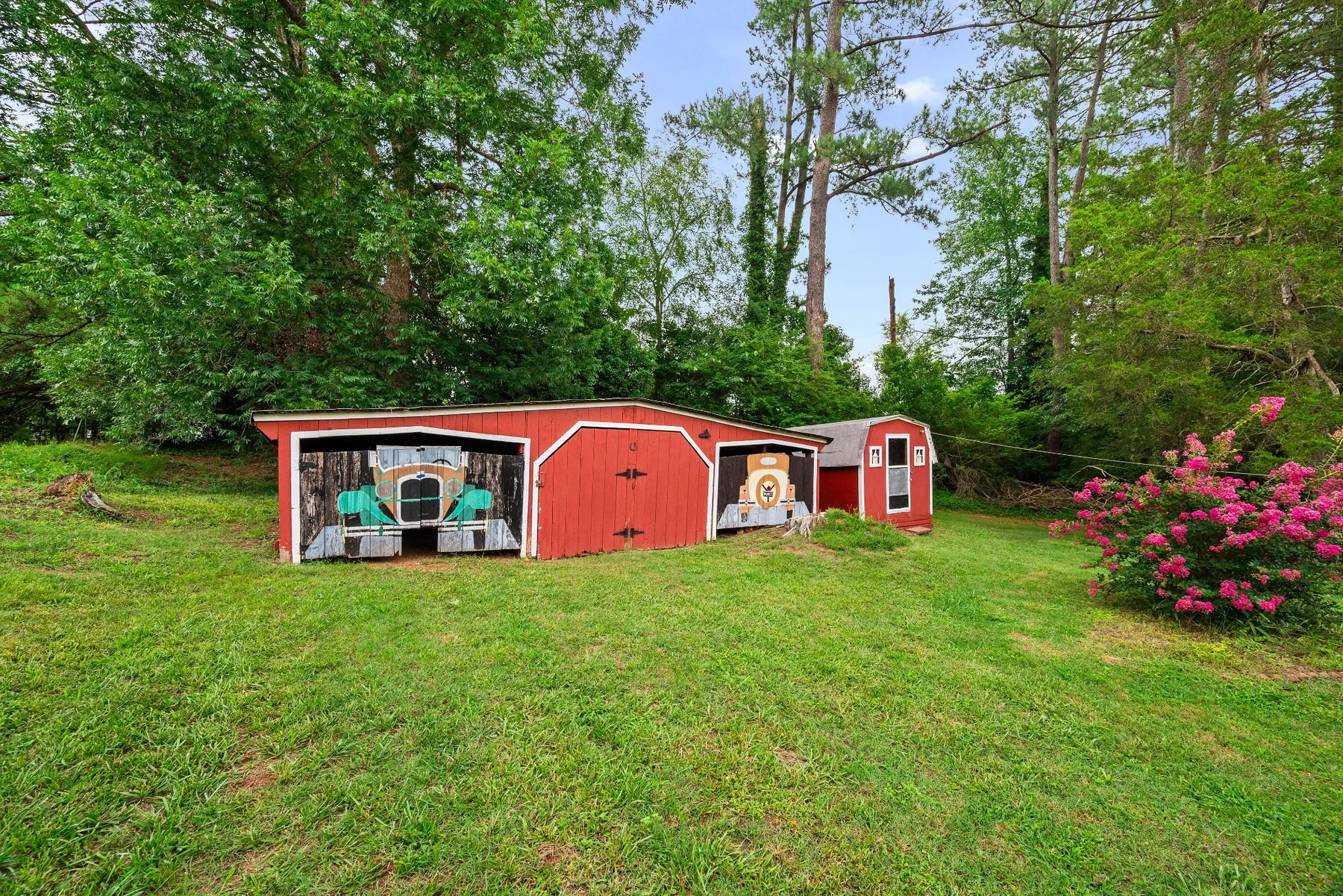 Backyard outbuilding and landscaped yard in Knightdale, NC