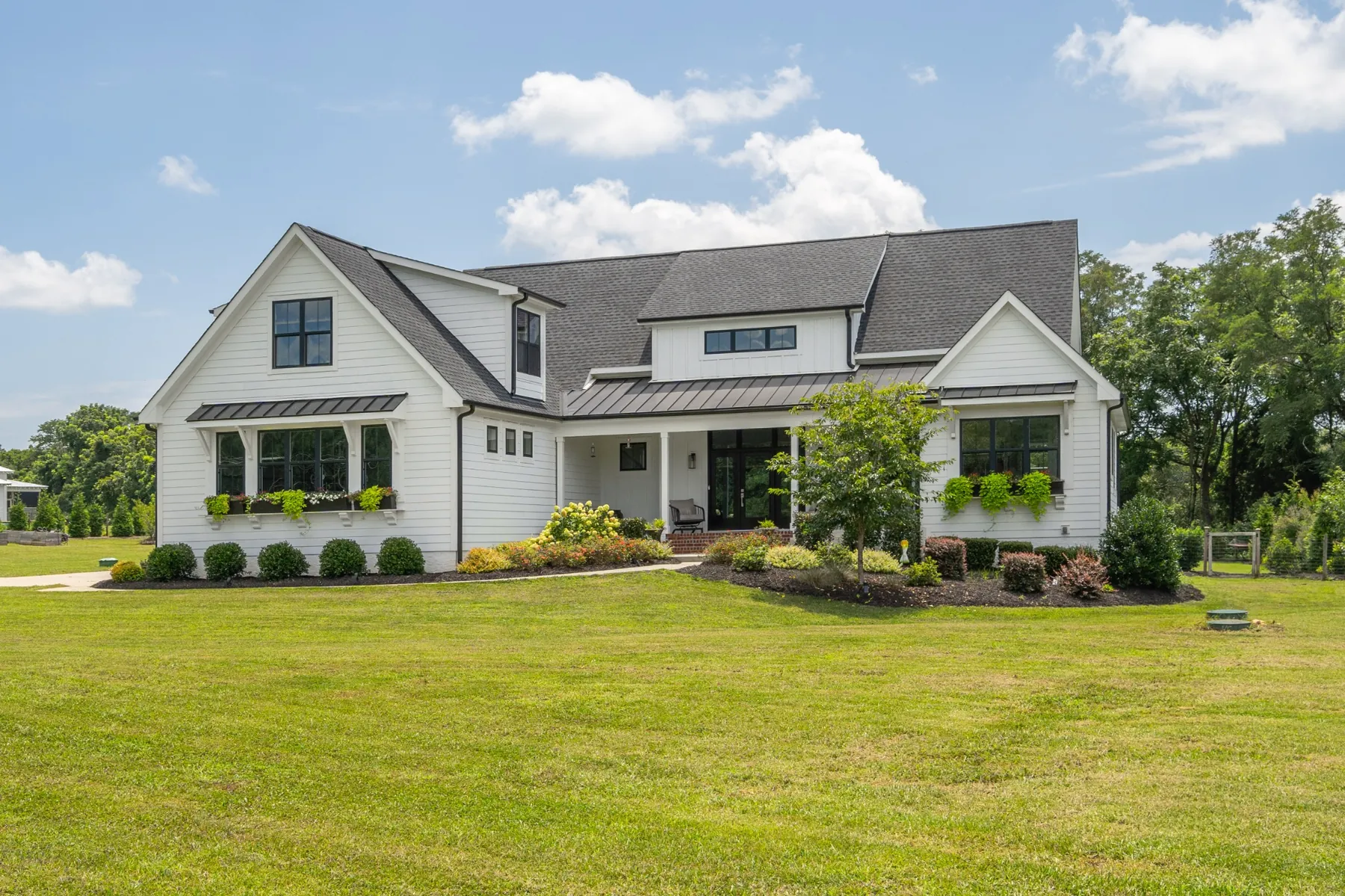 Custom white home on acreage in Mebane, NC