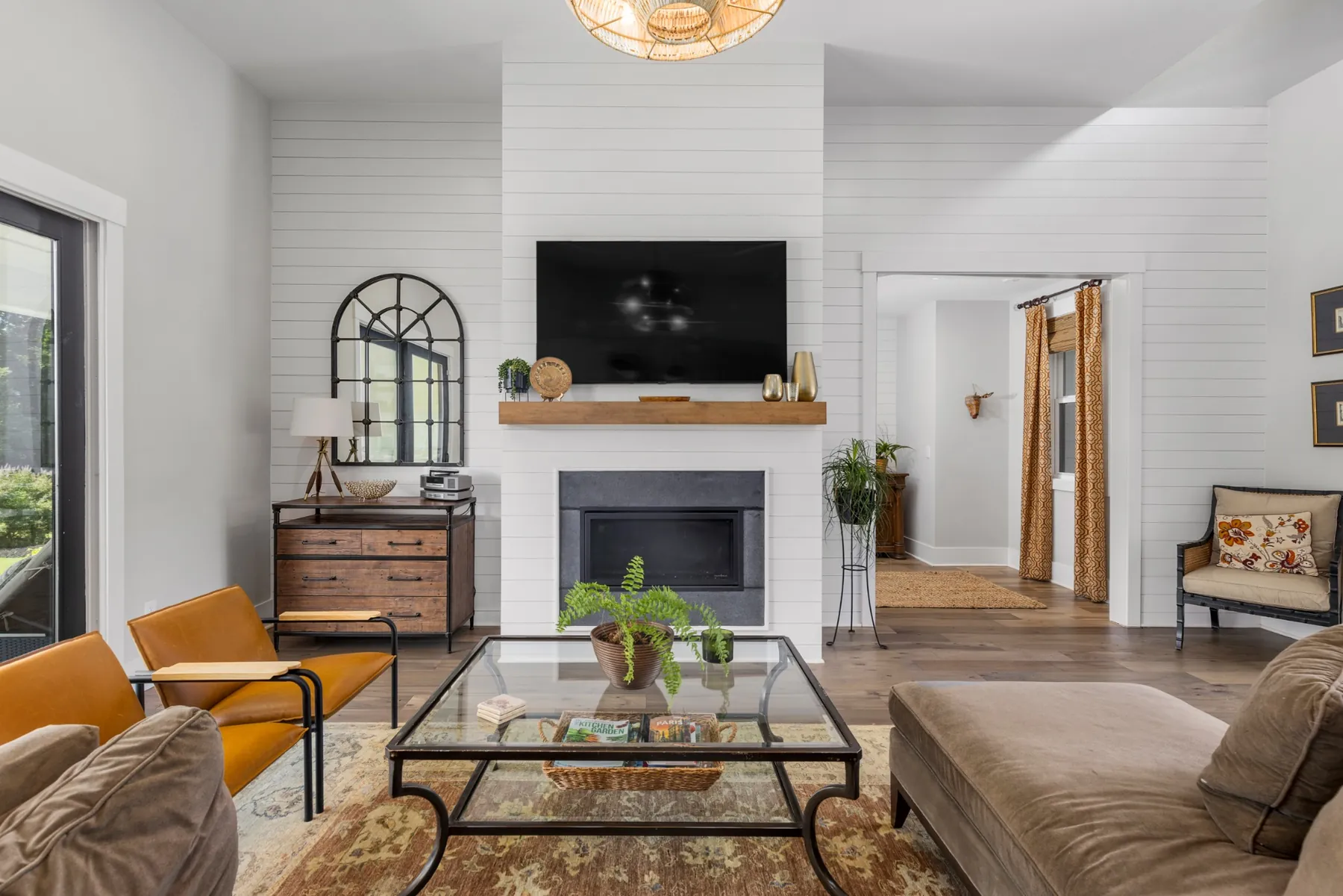 Living room with shiplap fireplace in Mebane, NC