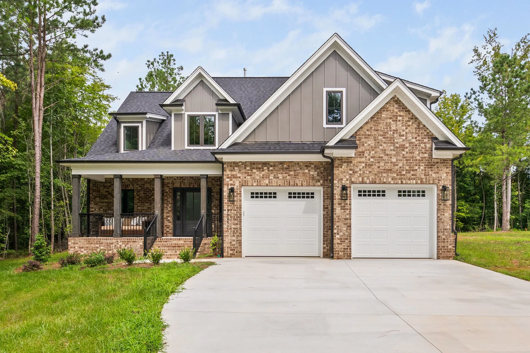 Brick and board-and-batten home exterior in Mebane, NC