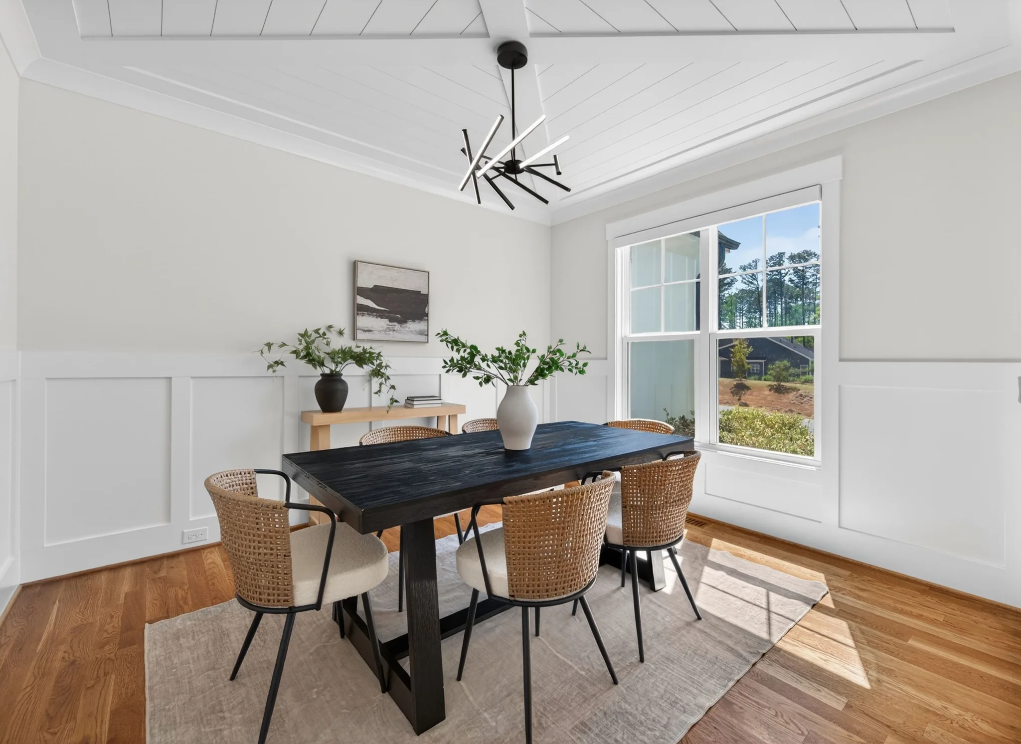 Bright staged dining room in a Pittsboro, North Carolina home.
