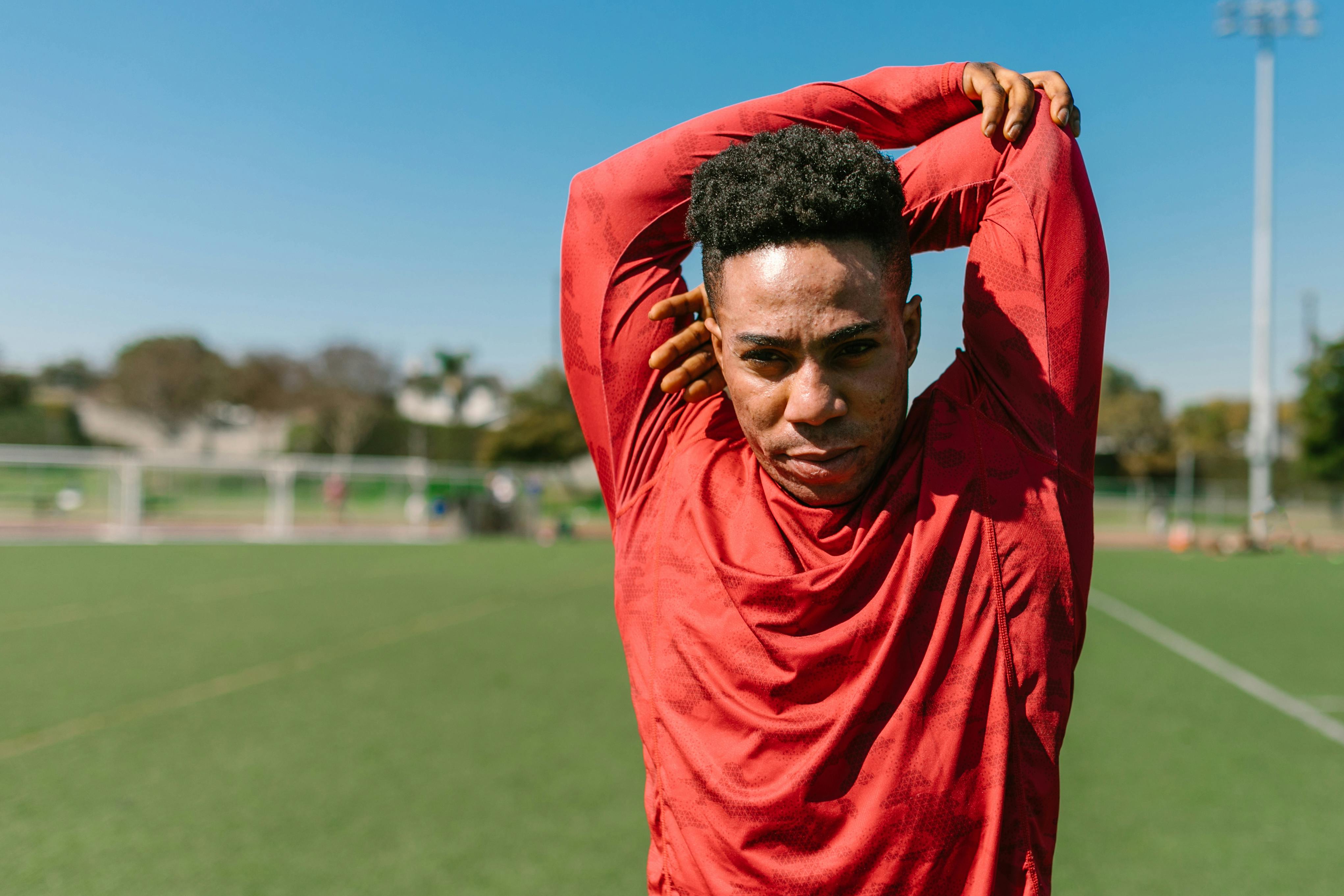Man stretching during athletic recovery, illustrating regenerative medicine and stem cell therapy benefits for men