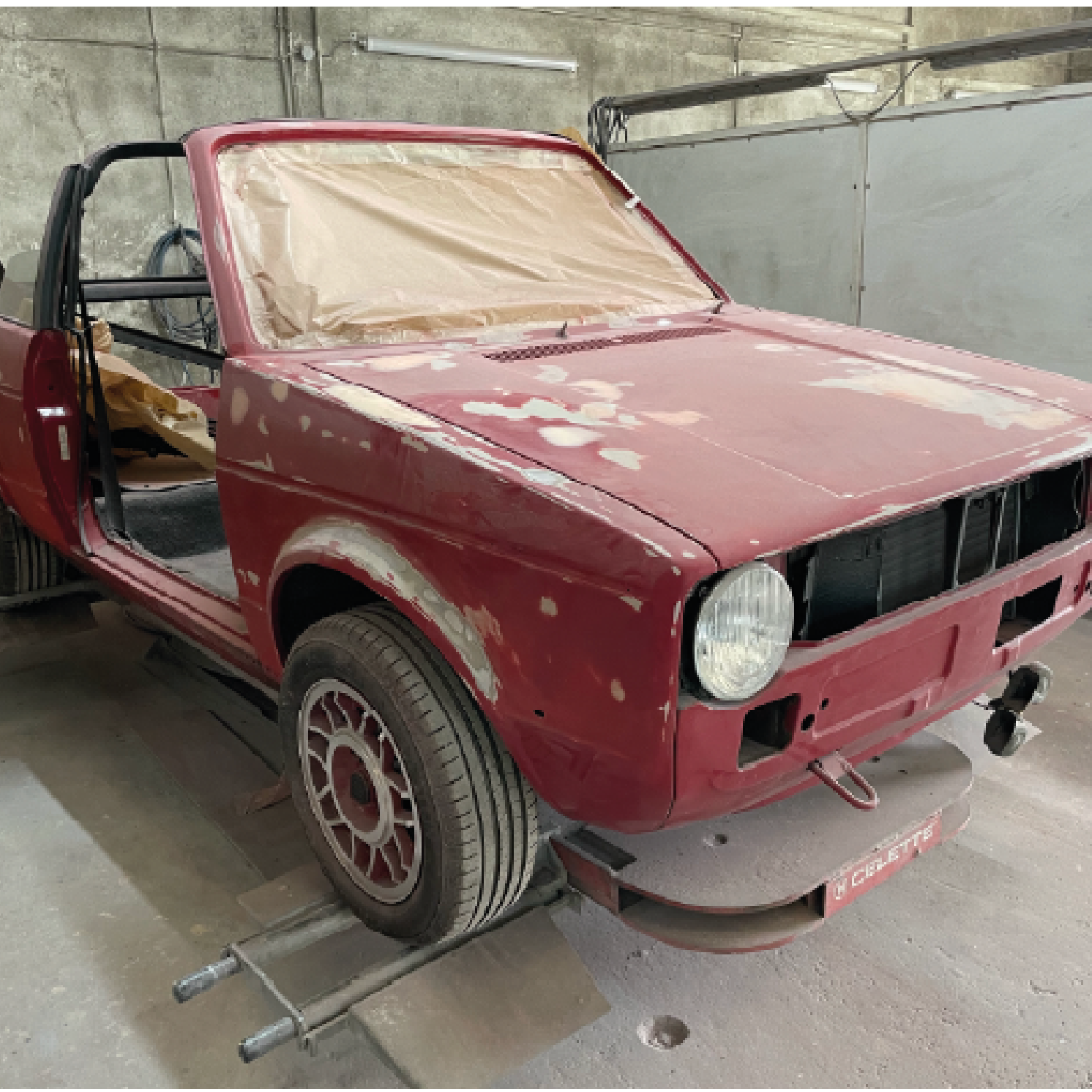 image of vehicles in showroom (for an auto dealership)