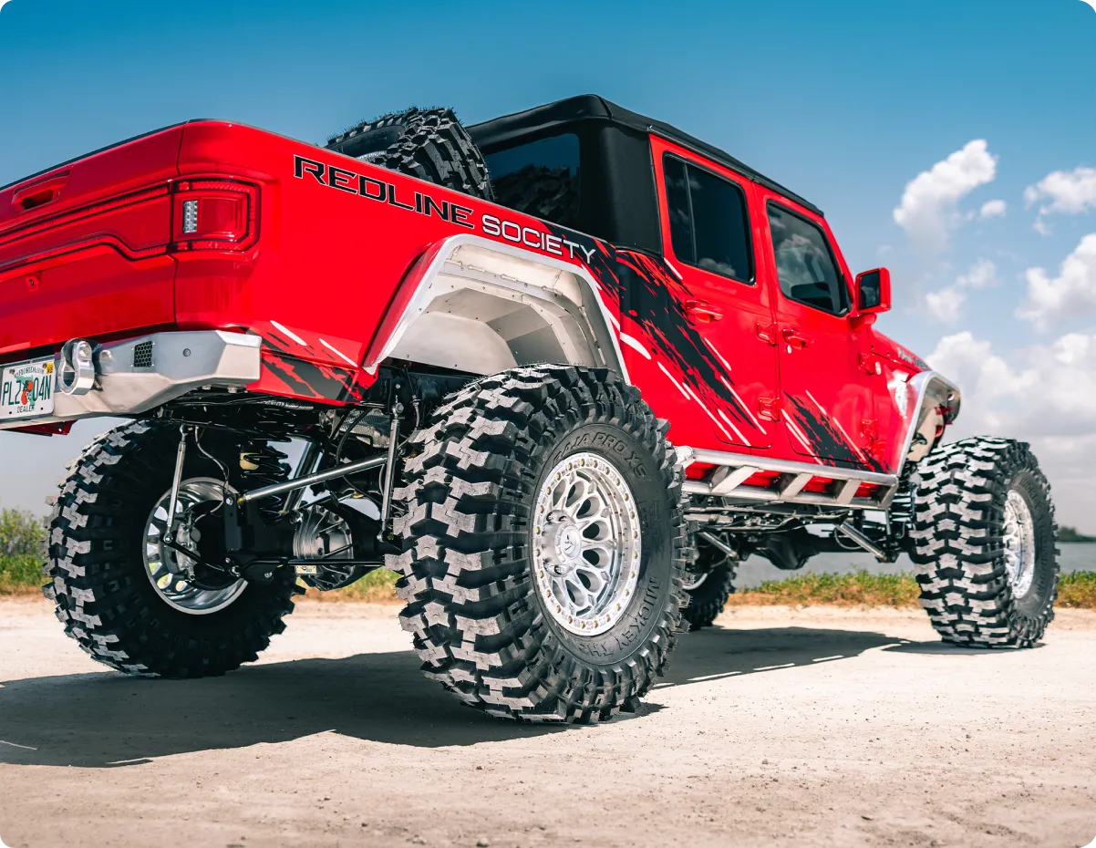 Redline Auto Creations shop interior with custom vehicle builds