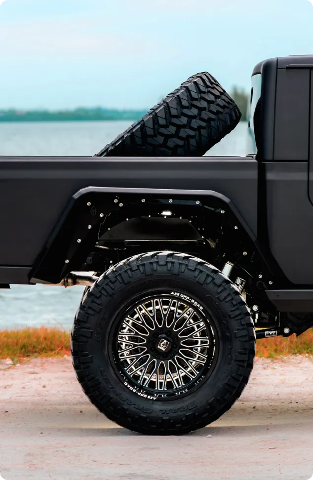 Lifted truck with custom wheels and off-road accessories