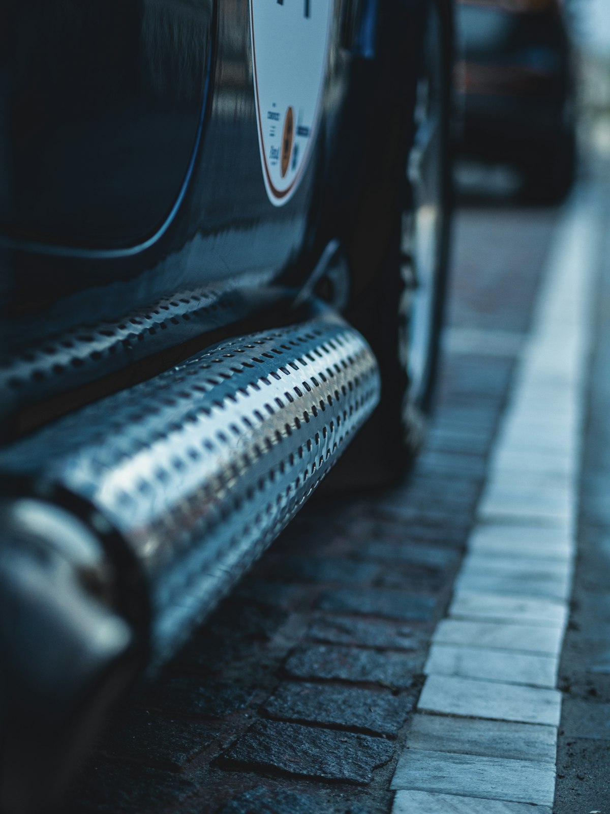 Black truck on brick road with accessories