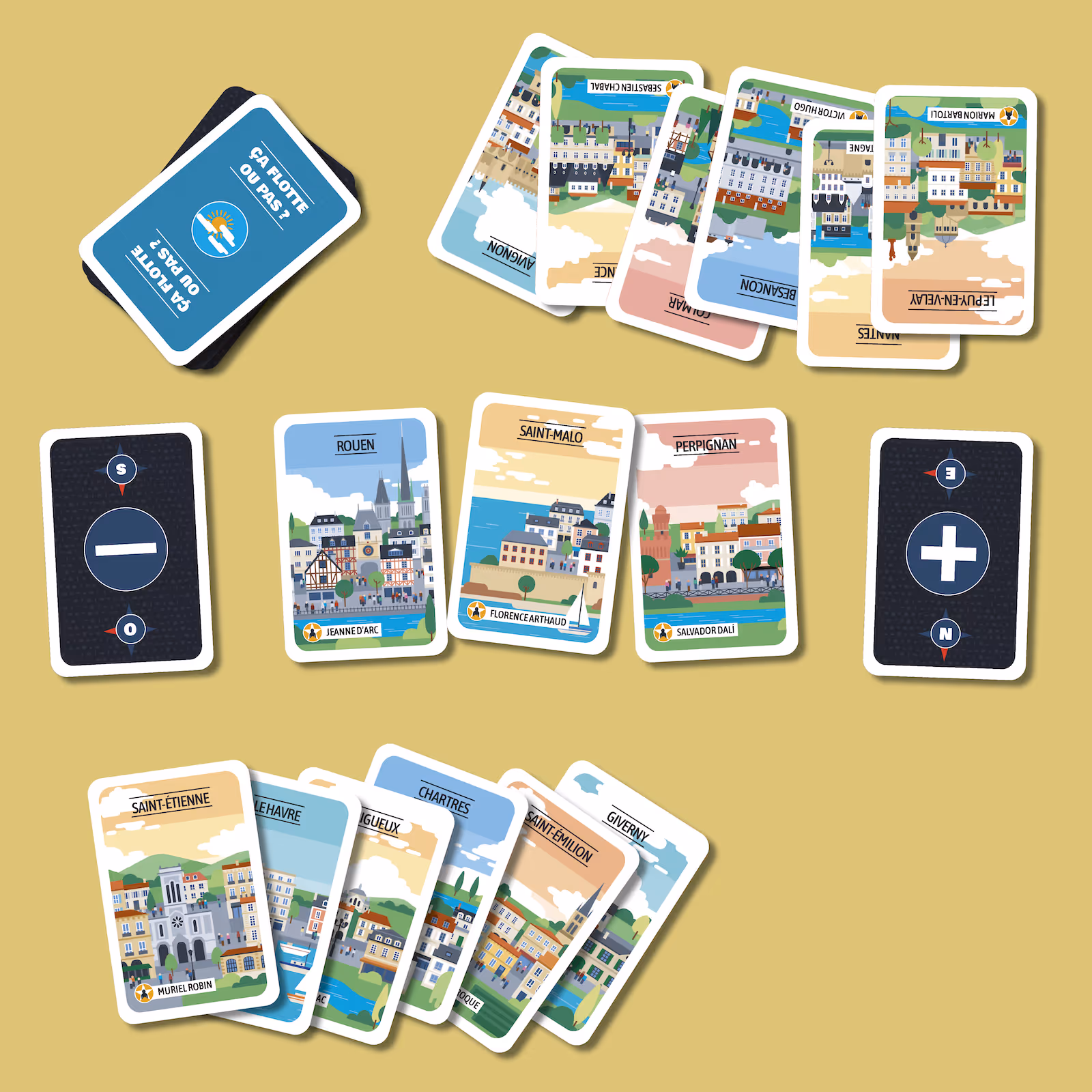 Cartes de jeu illustrant différentes villes françaises avec des noms comme Rouen, Saint-Malo et Perpignan, disposées sur une surface beige.