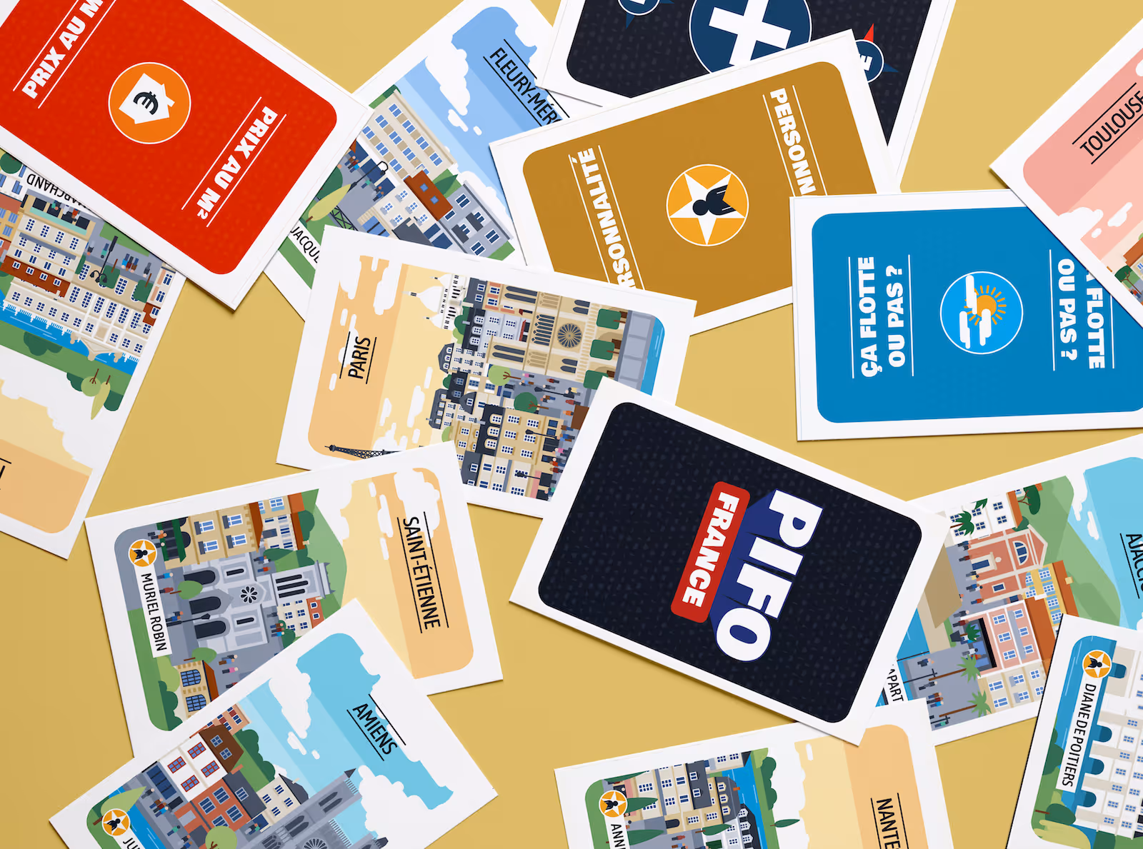 Cartes de jeu PIFO France avec illustrations de villes françaises et icônes variées sur fond beige.