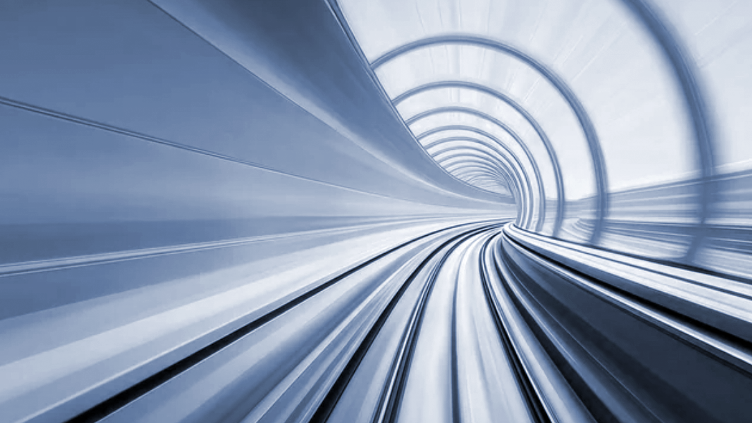 Image of a way that looks like an open tunnel with daylight. The image gives an idea of speed before the curve.