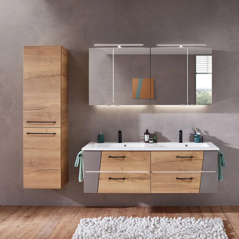 Modern bathroom with wooden cabinets, double sinks, and large mirrors against a gray wall.