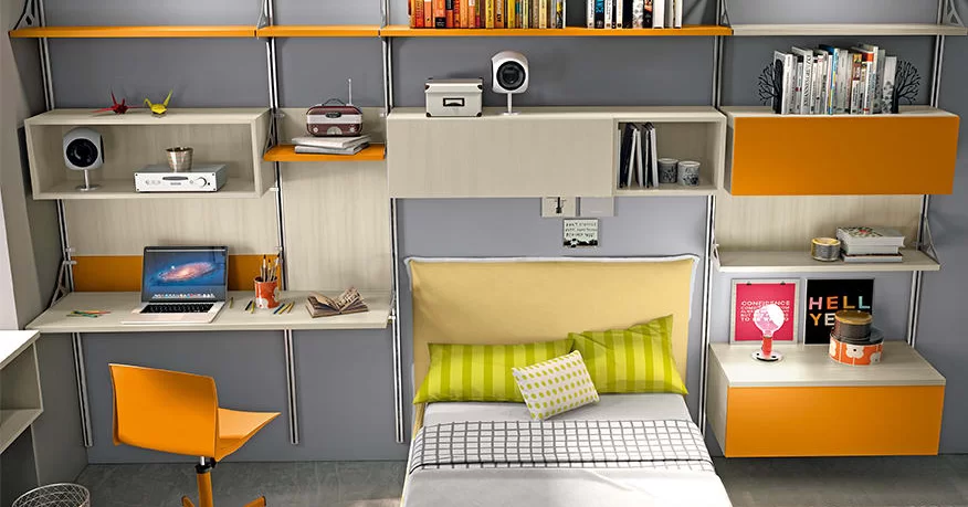 Room with a neatly organized desk, shelves with books, and a bed with striped pillows.
