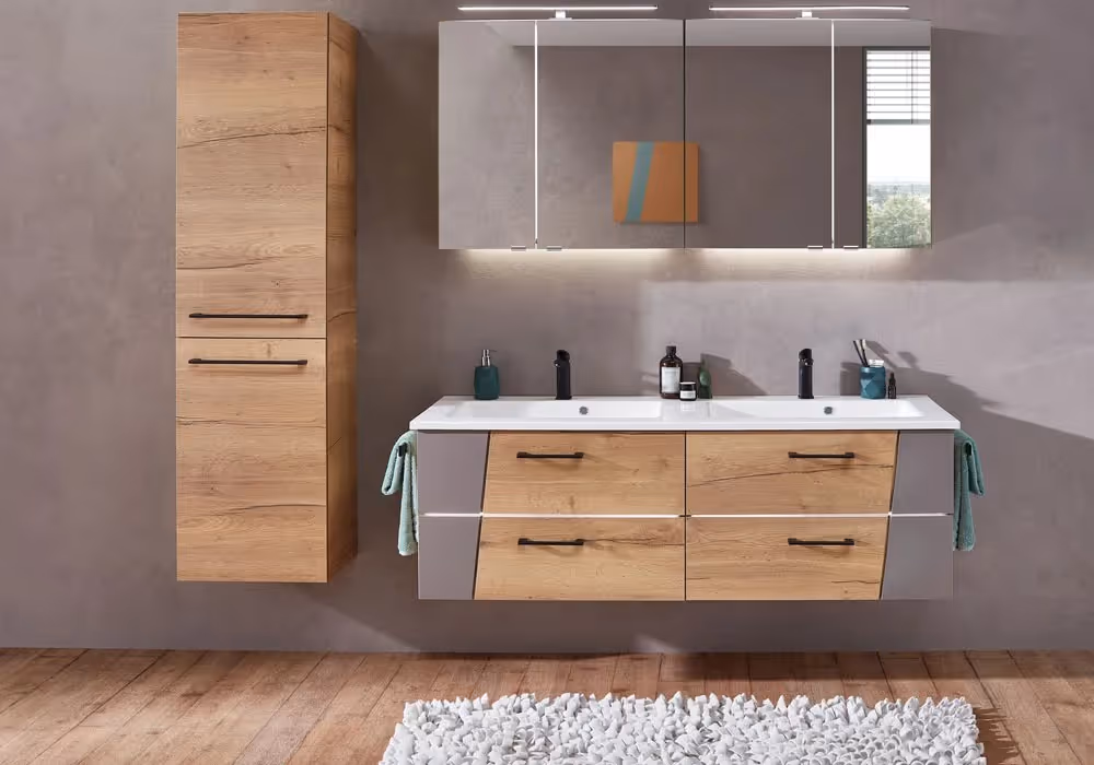 A modern bathroom features a double sink vanity with wooden cabinets and a large mirror above.