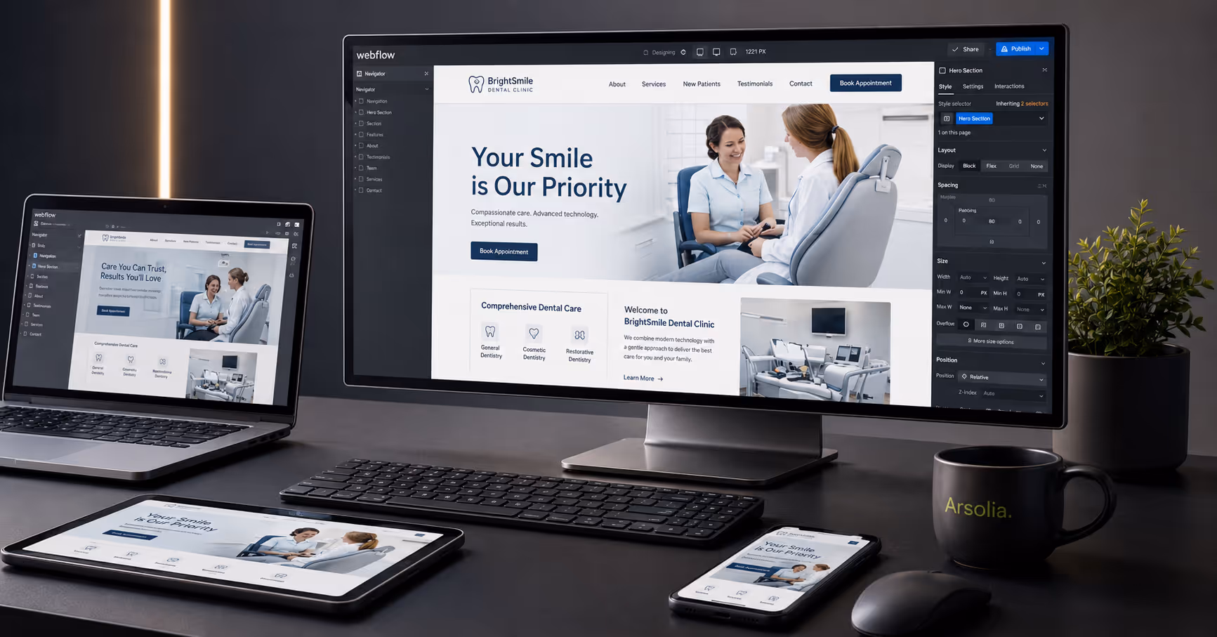 Web design workspace showing a dental website being built in Webflow on a desktop monitor.