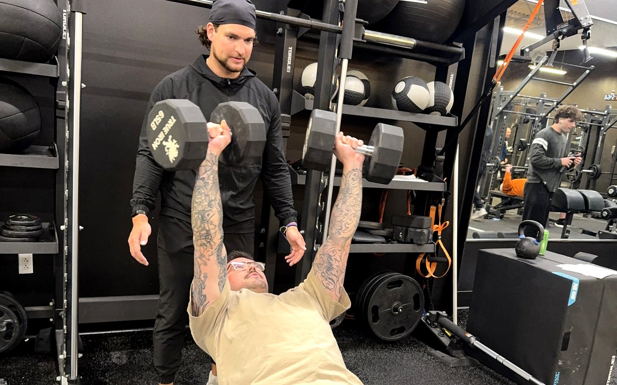 Dumbbell press with coach at Iron 24 Pittsburgh