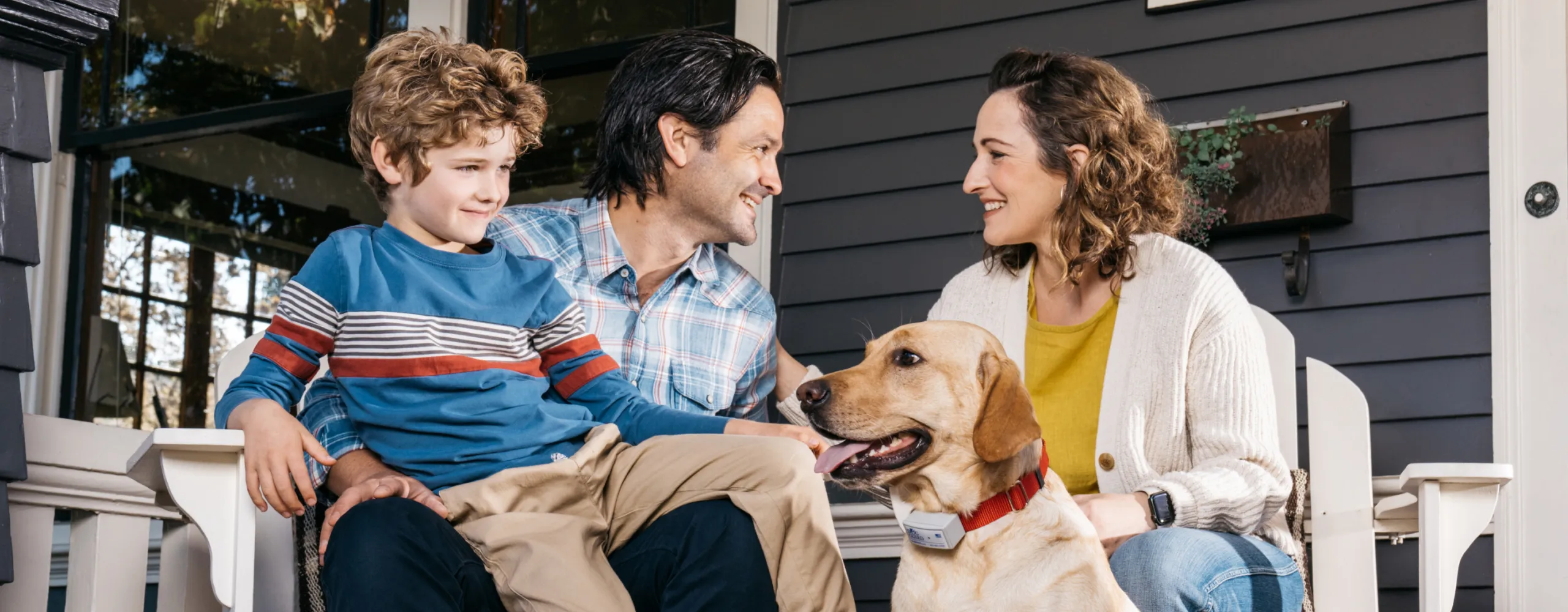 Family and dog enjoying outside