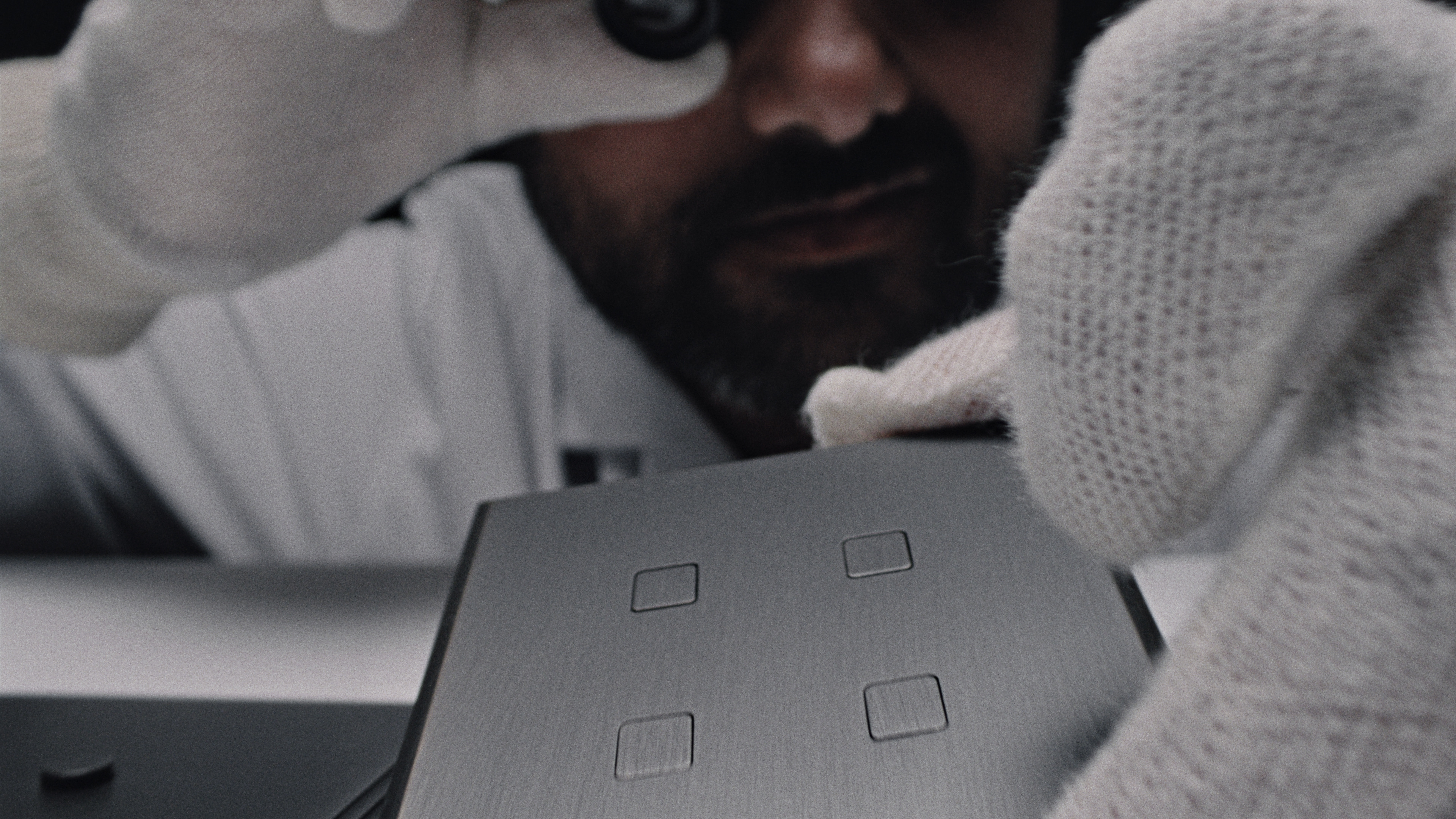 Craftsman inspecting an Atelier Luxus switch plated
