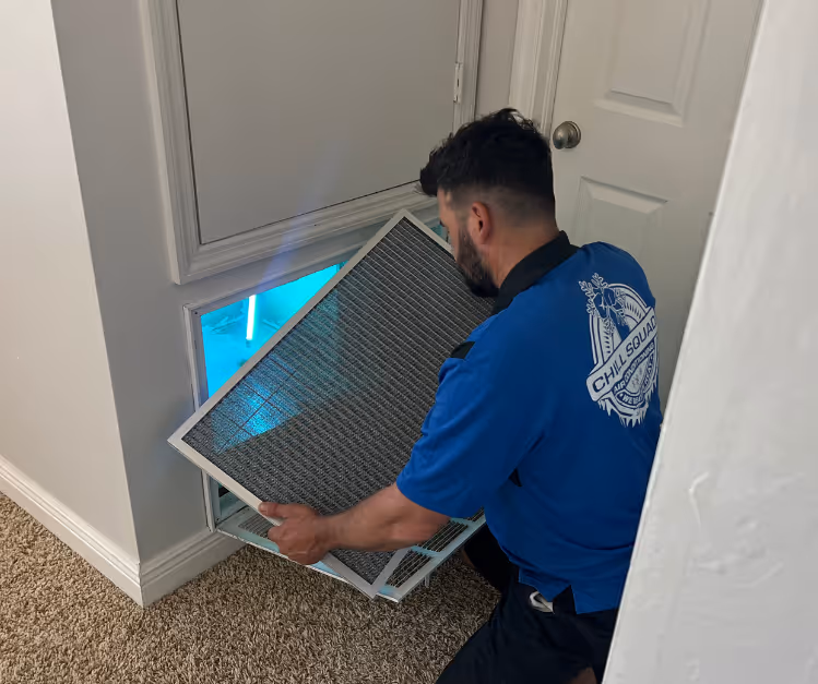 Air filter check with UV light to ensure great air quality in cape Coral, FL home. 