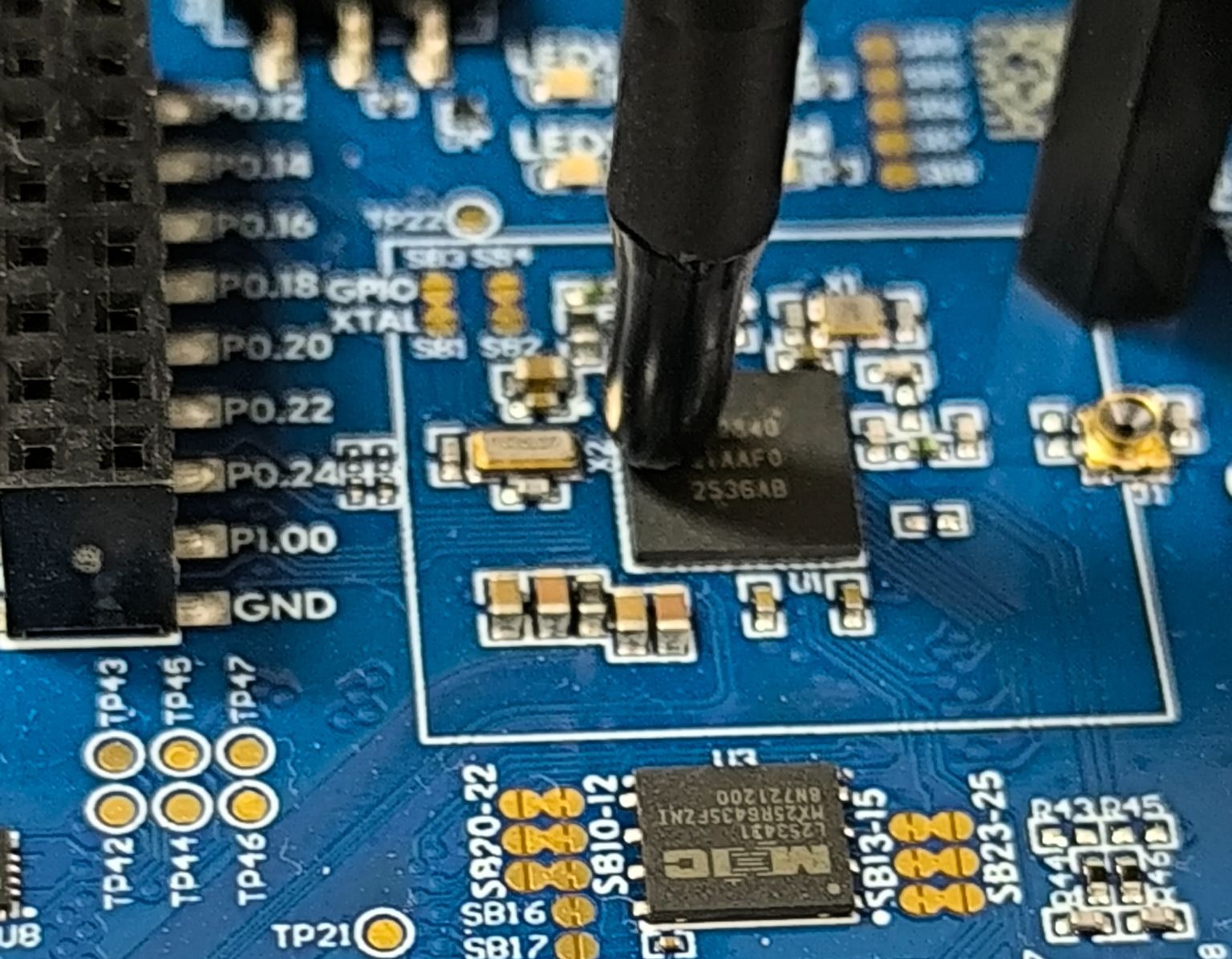 EM probe positioned over the nRF52840, above the CryptoCell-310 region.