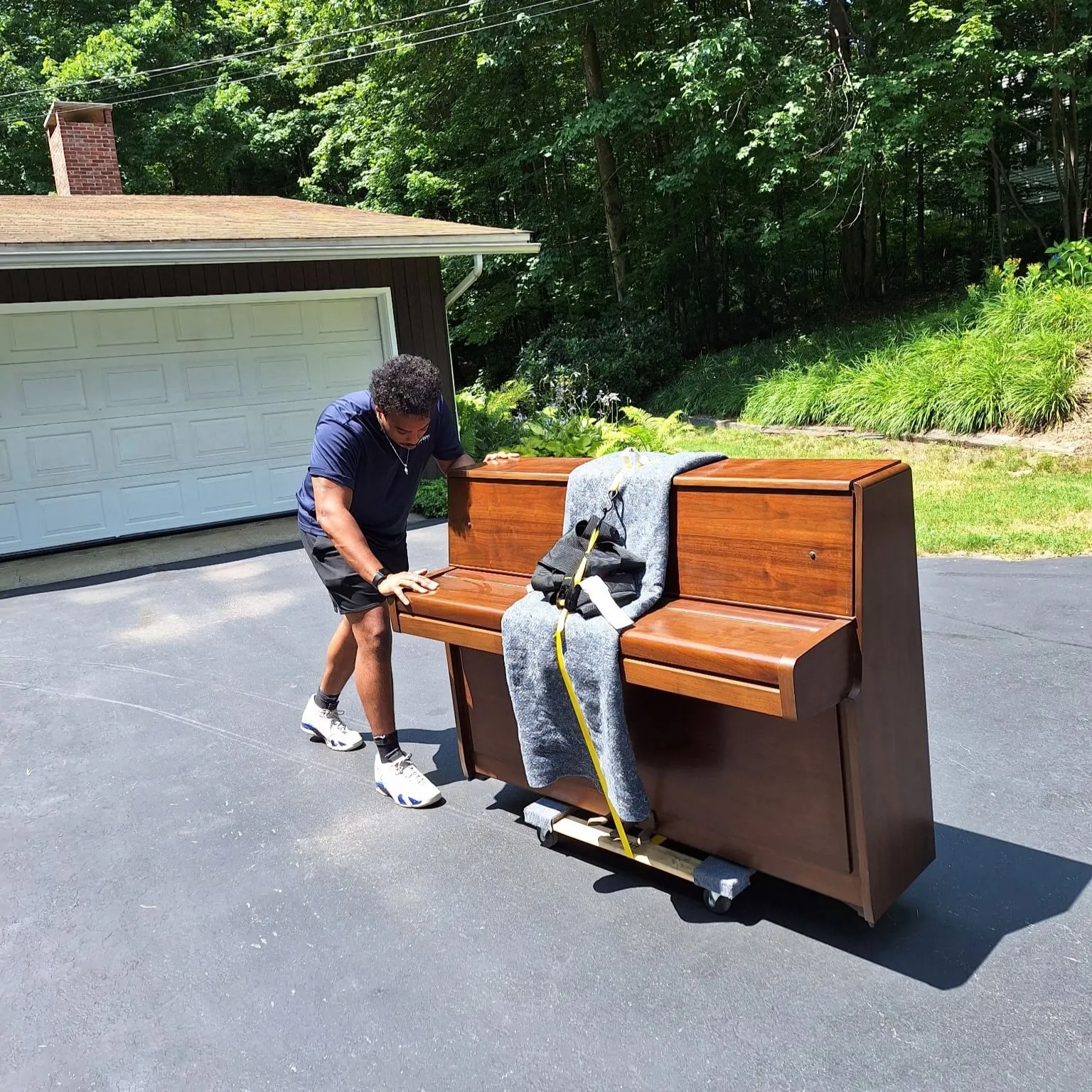 image of a humanitarian aid fundraising event, with volunteers stacking boxes in a modern yet welcoming space
