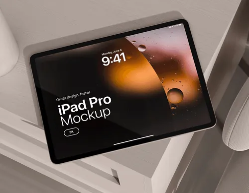 iPad Pro on a light-colored desk showing a lock screen with time 9:41 and text iPad Pro Mockup.