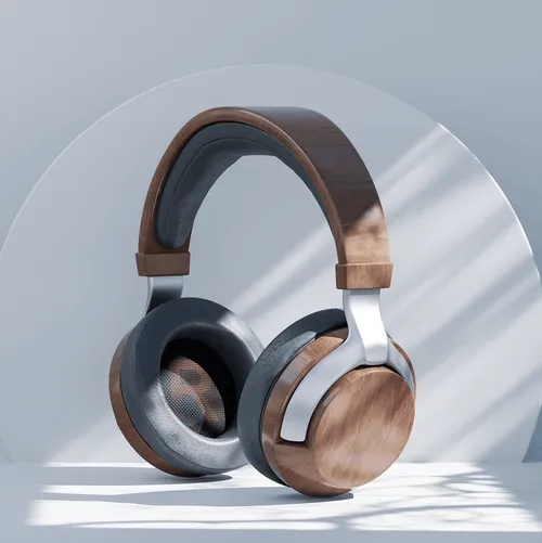Over-ear wireless headphones with wood and metal design on a white surface with shadows.
