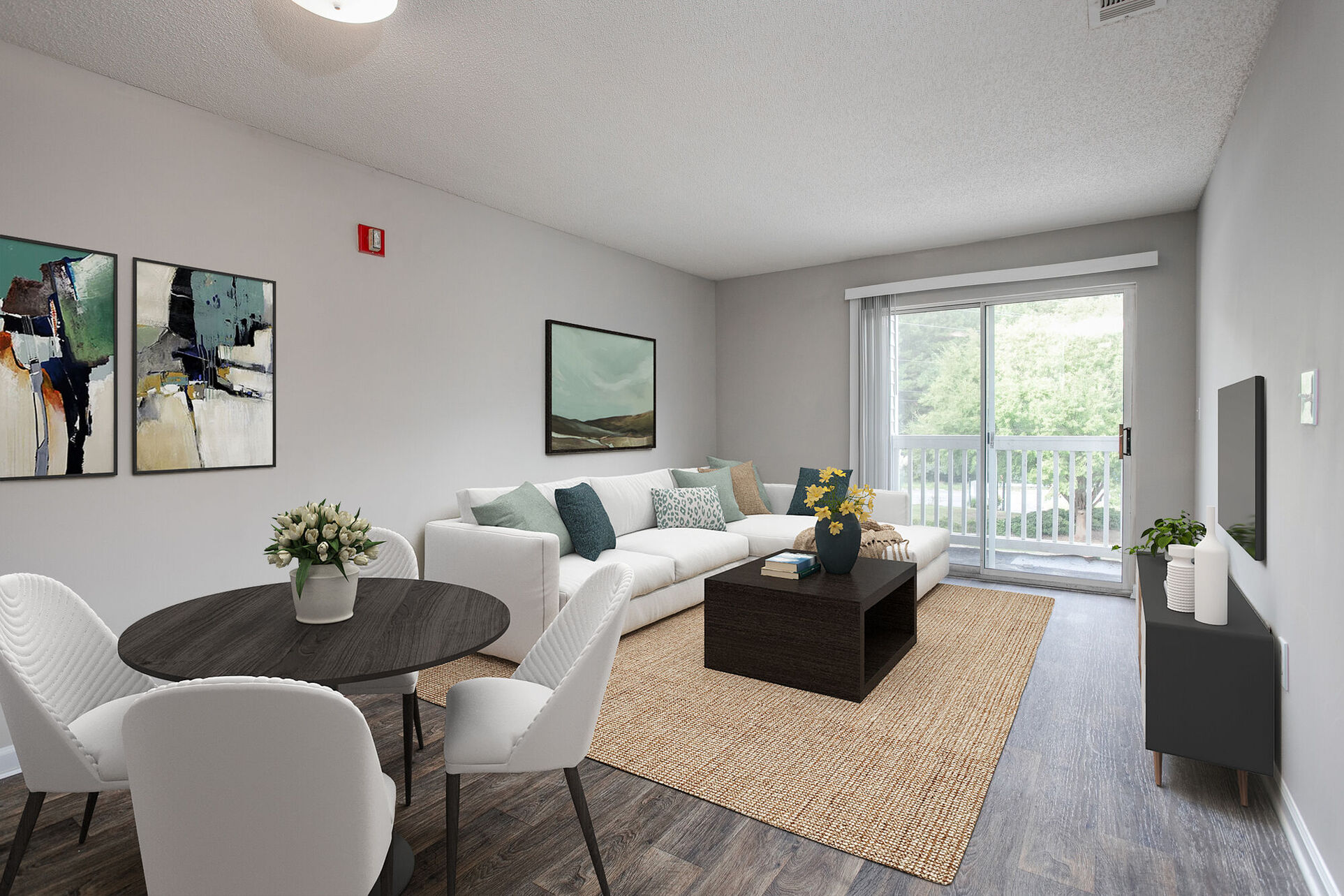 Virtually Staged living and dining area with sofa, table, and chairs
