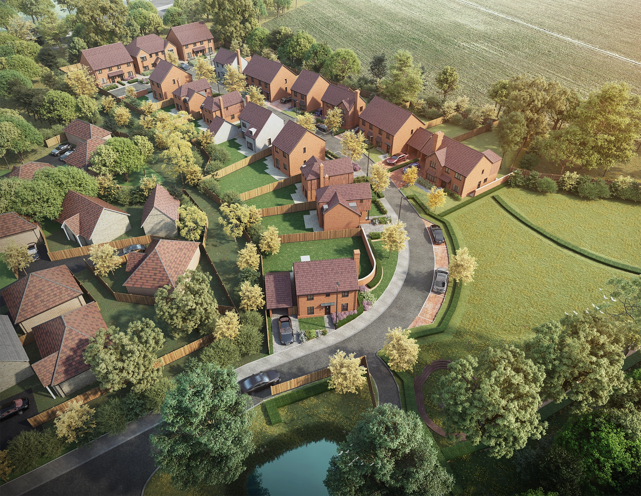 Aerial view of a suburban neighborhood with detached brick houses, curved roads, green lawns, and many trees surrounding the homes and fields.