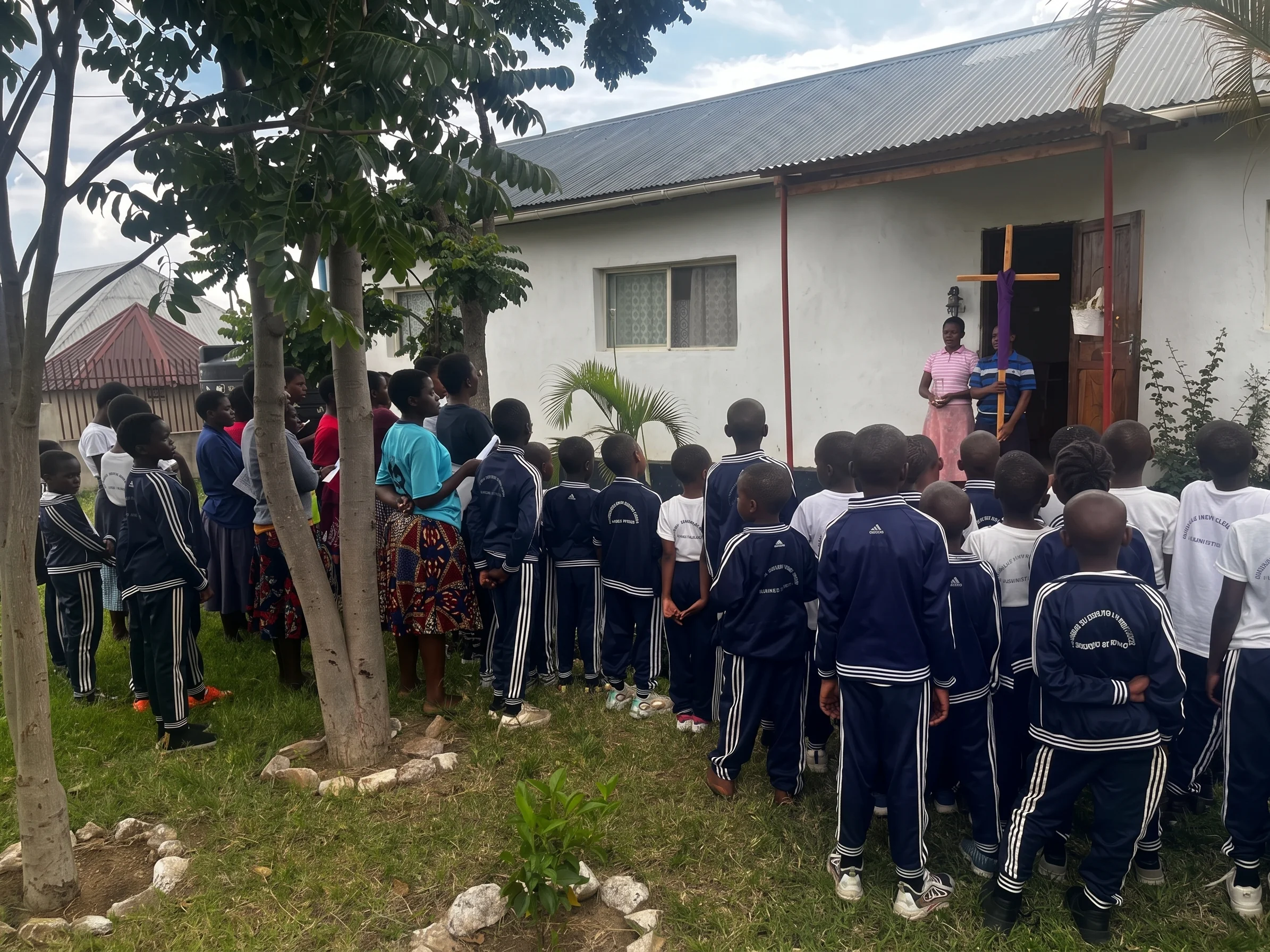 Children waiting outside building
