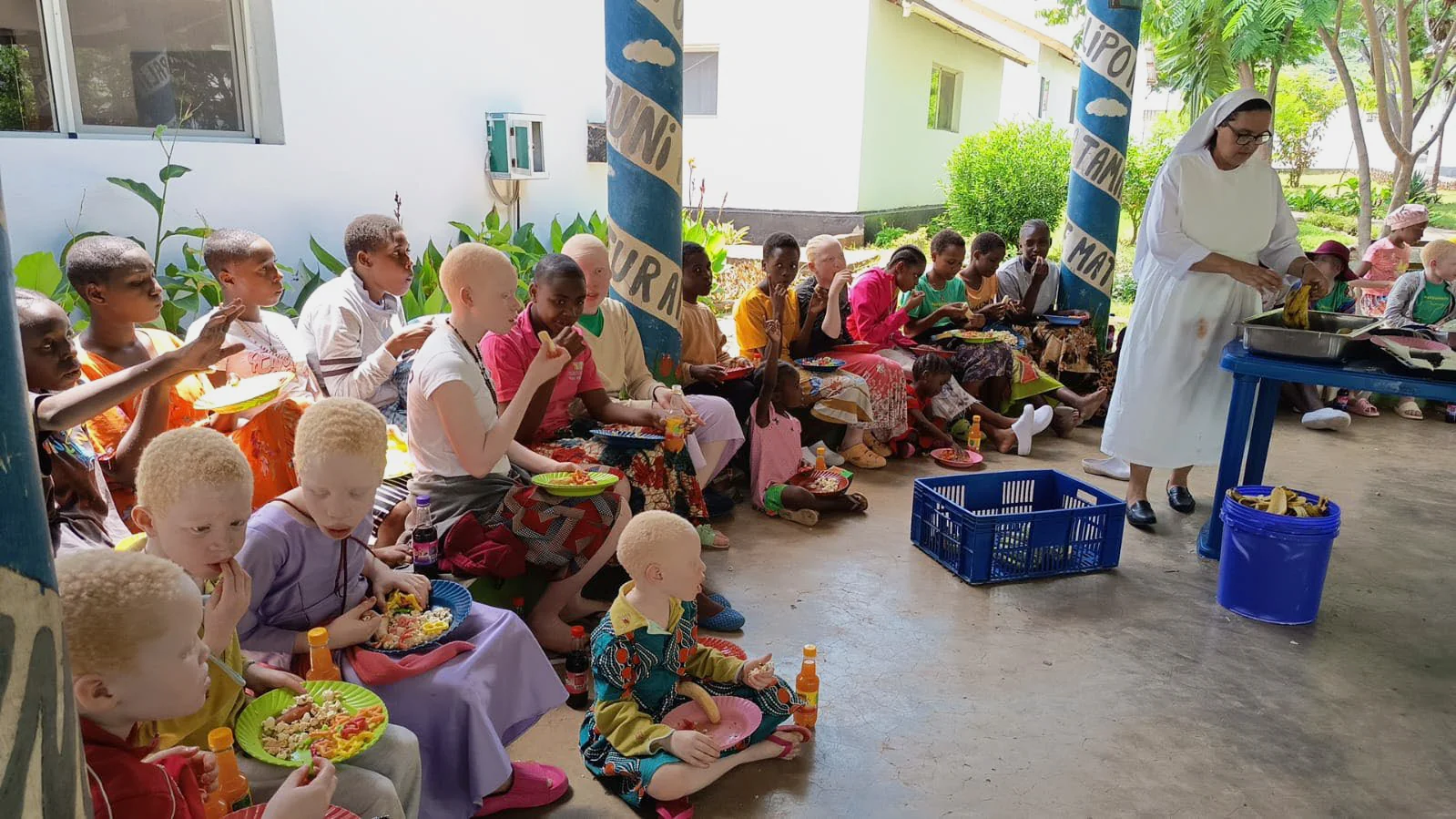 Some of the children taking food