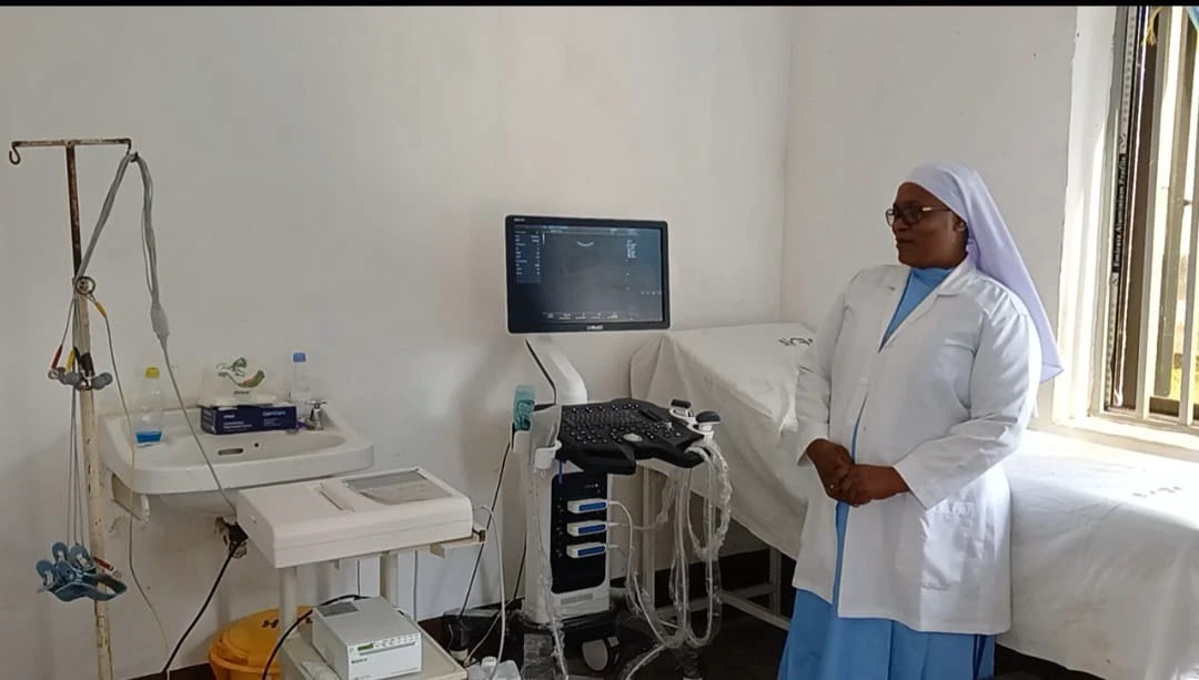 A sister at the ultrasound machine in the imaging room