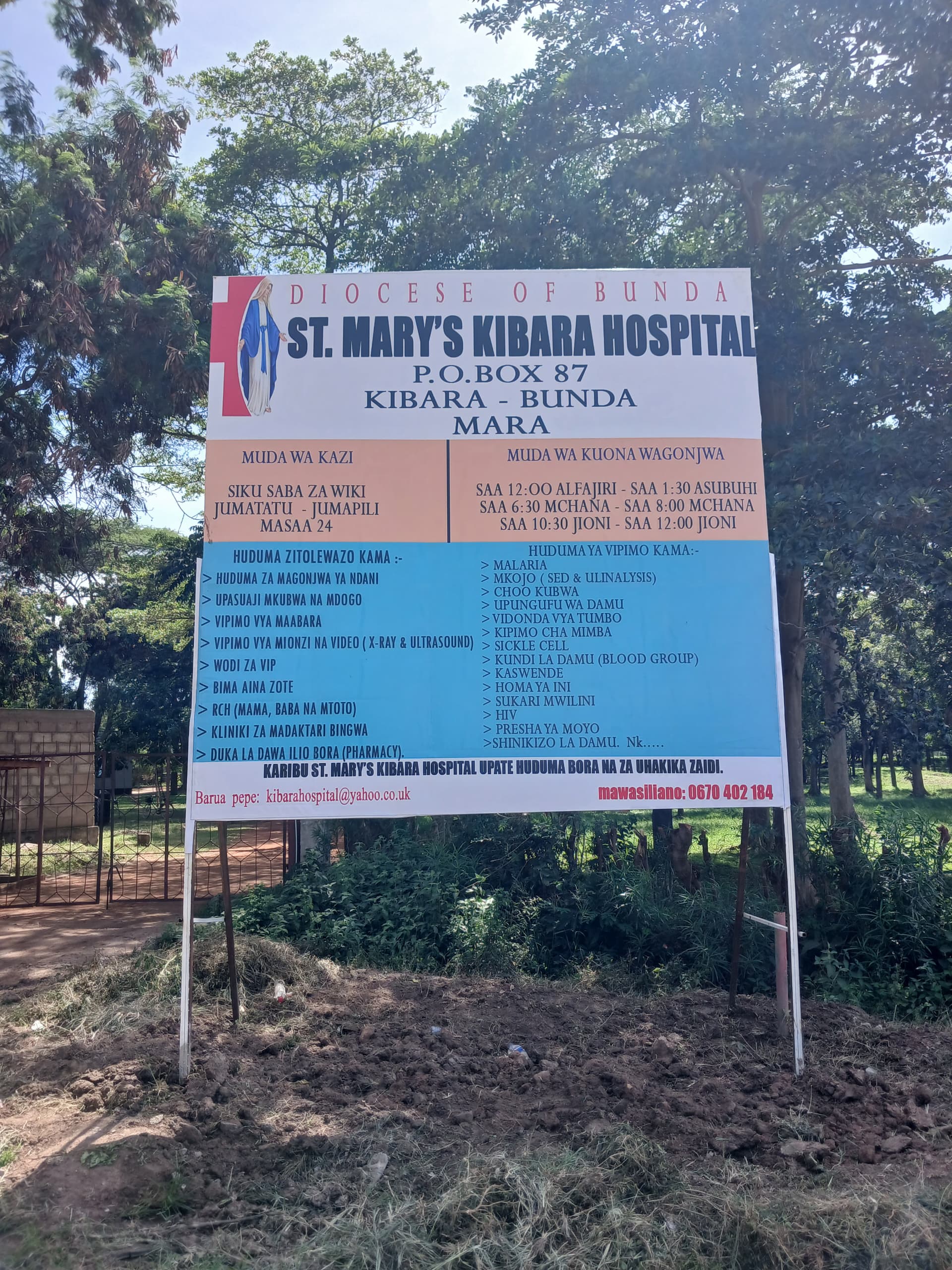 The hospital signboard at the entrance in Kibara