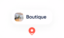 Icône d'un magasin avec une étiquette indiquant 'Boutique' et un marqueur de localisation rouge en dessous.