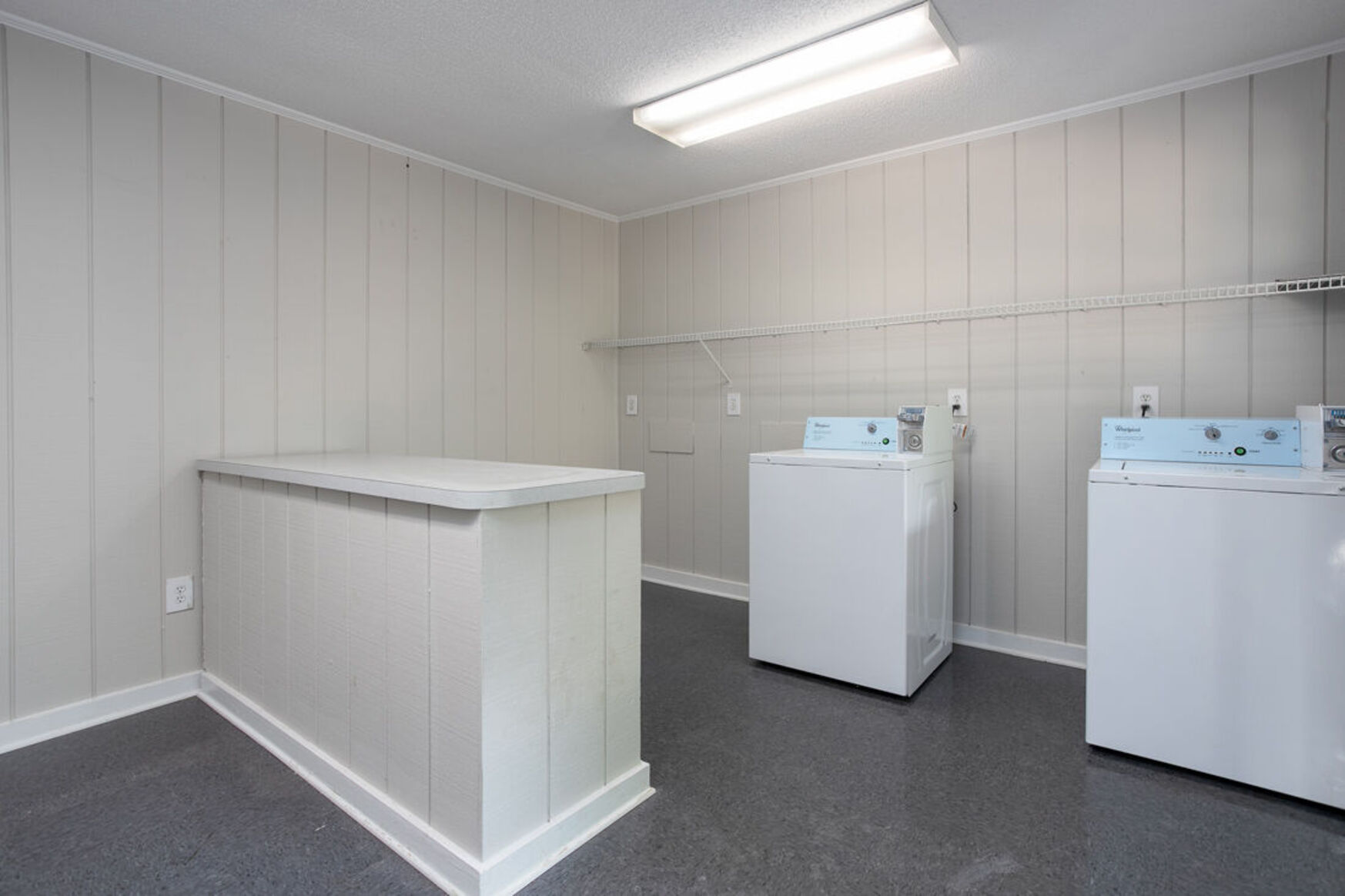 Laundry room with washers and dryers
