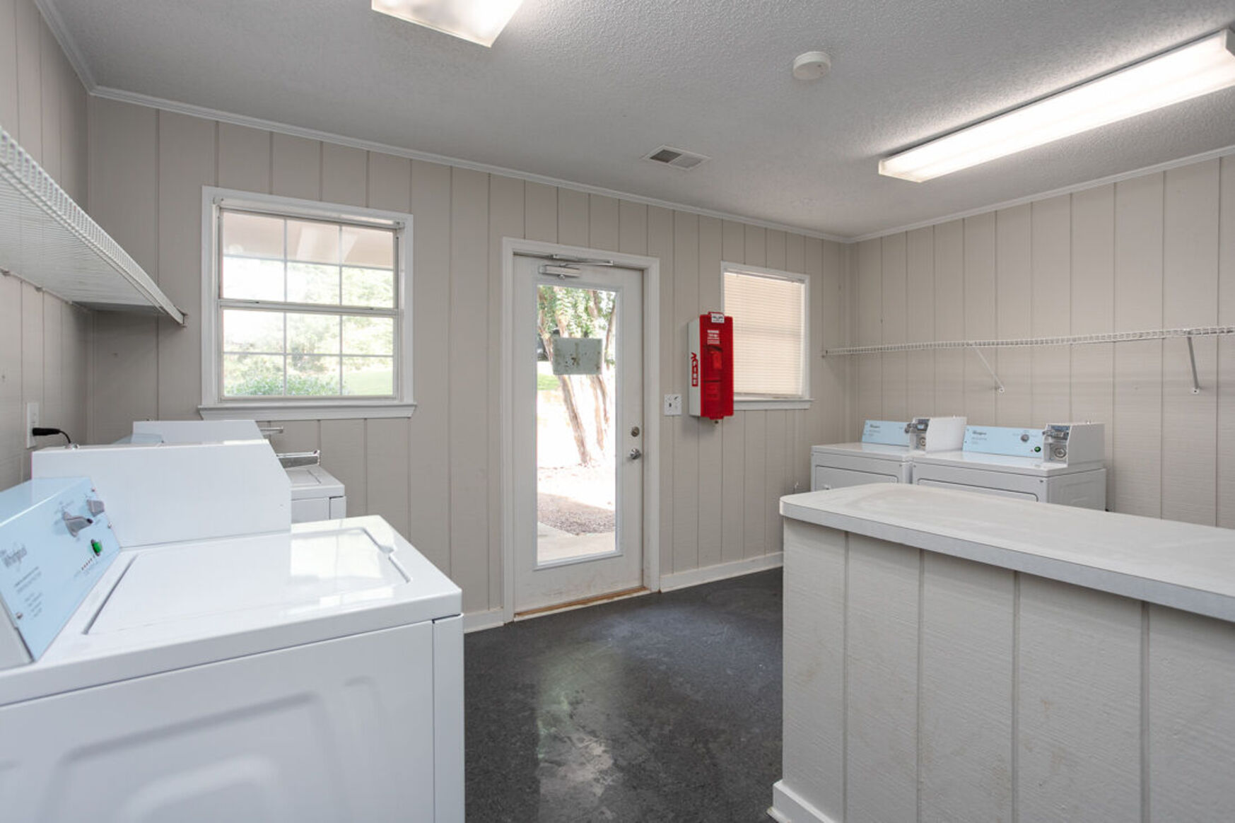 Laundry room with washers and dryers