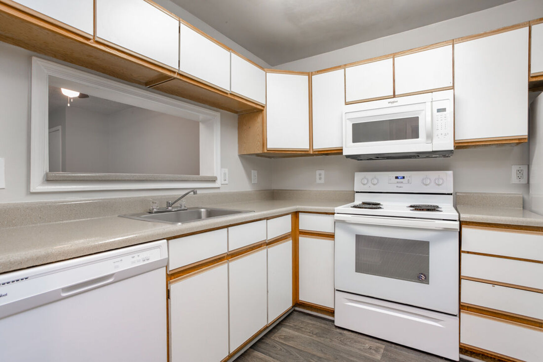 Kitchen with brown and white cabinets 