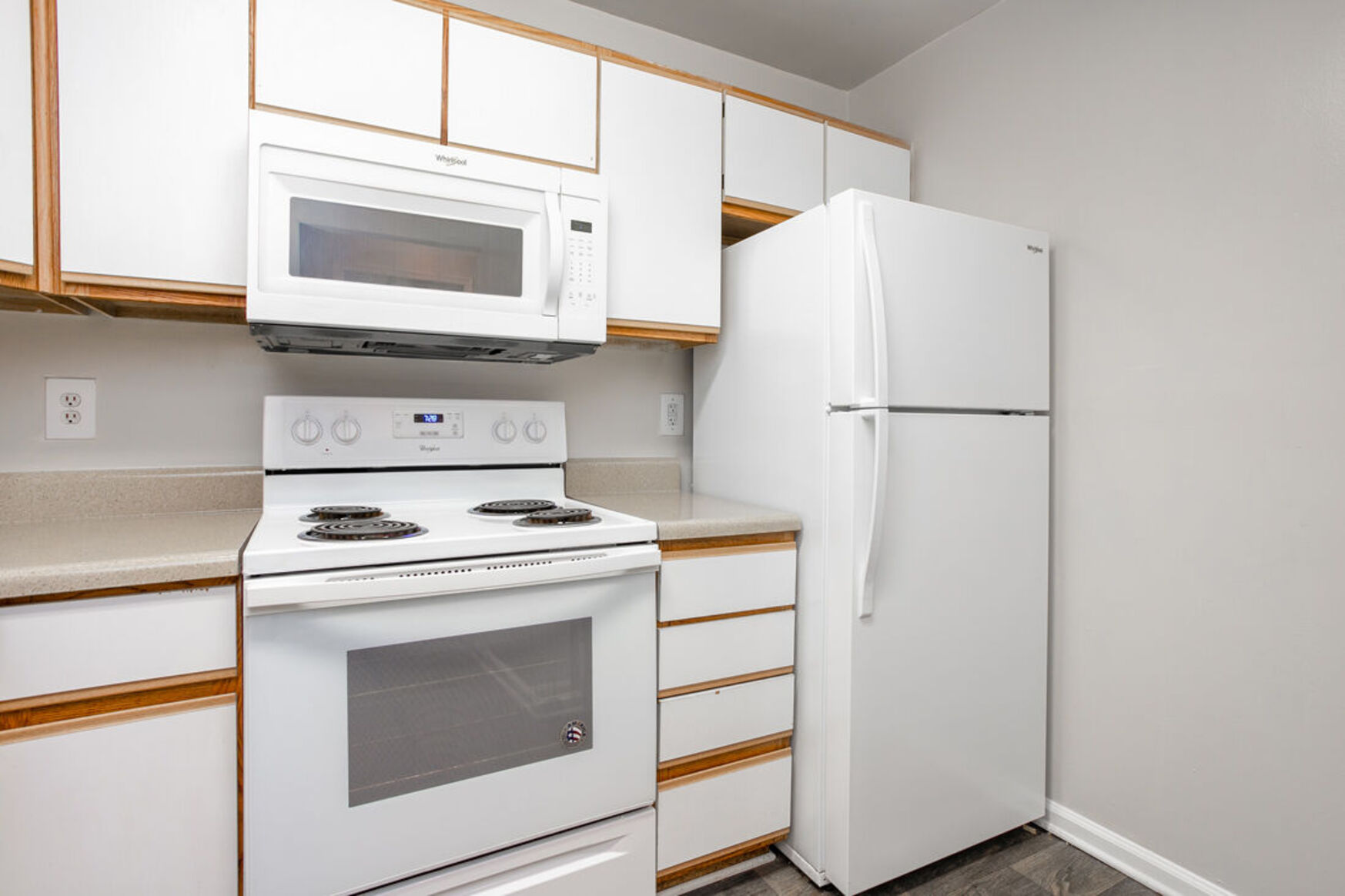 Kitchen with brown and white cabinets 